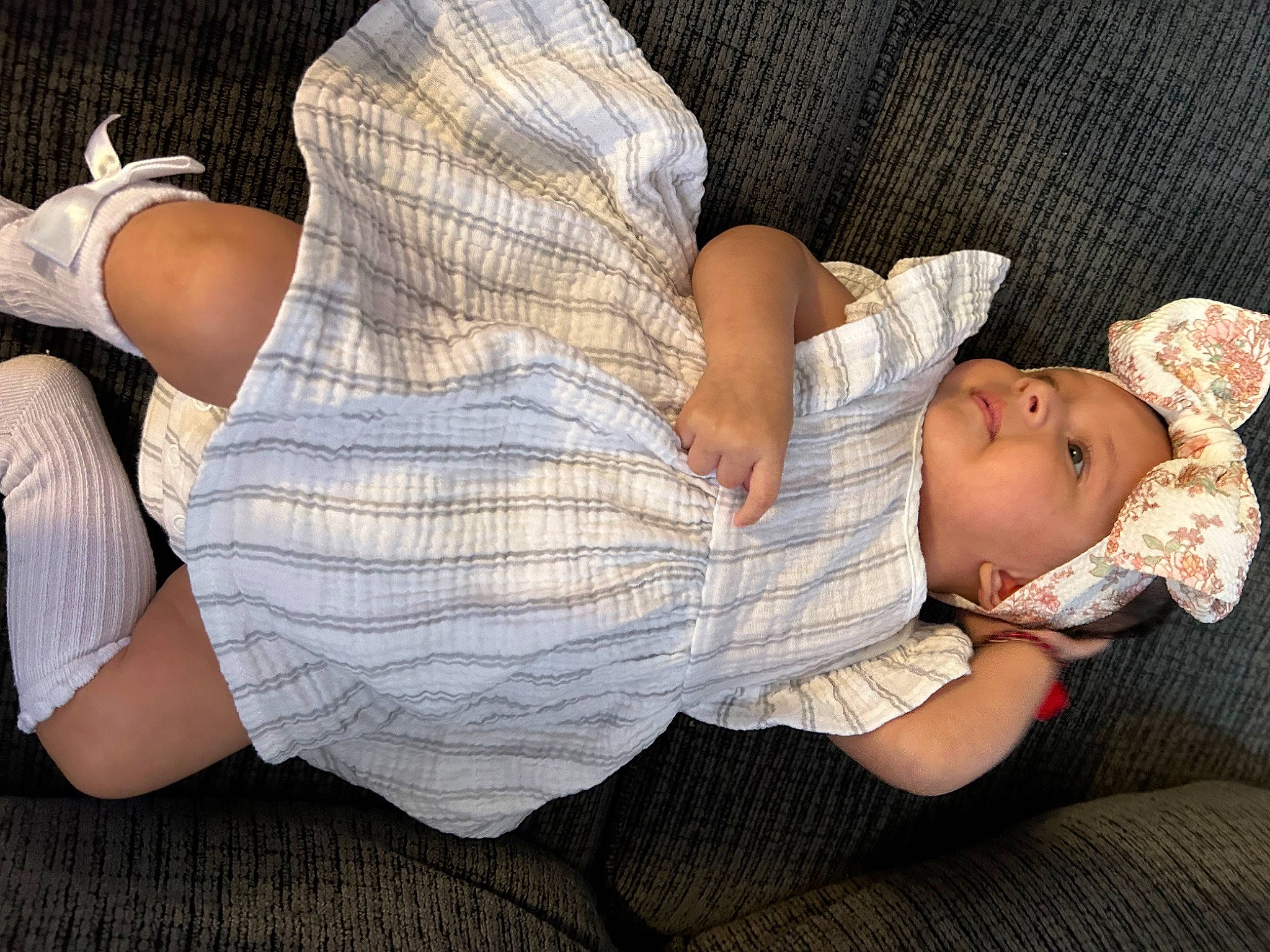 Angeline is registered to the contest to win money with this photo: abdomen, baby, baby_toddler_clothing, chest, comfort, elbow, finger, hand, headwear, human_body, human_leg, interaction, joint, knee, lap, leg, muscle, person, thigh, toddler