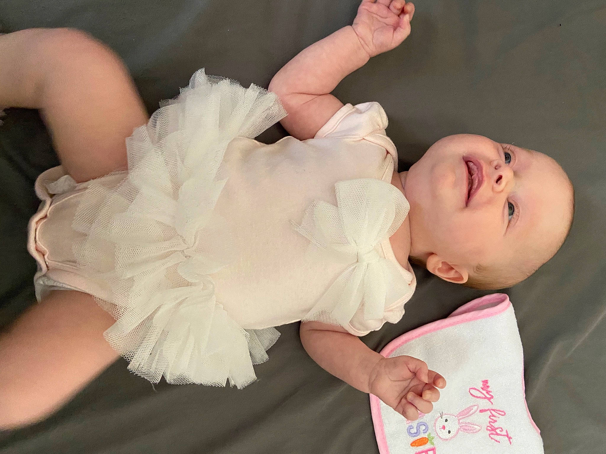 Kiera is registered to the contest to win money with this photo: arm, baby, baby_products, baby_toddler_clothing, child, costume, dress, ear, fashion_accessory, finger, gesture, hair_accessory, hand, headpiece, neck, nose, person, pink, product, skin
