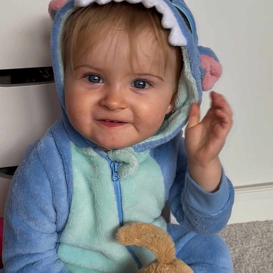 Nevaeh joined the competition — help win amazing prizes! baby, bodypart, bonnet, cap, clothing, face, finger, hand, happy, hat, head, hood, hoodie, knitwear, person, photography, portrait, sweater, sweatshirt, toy