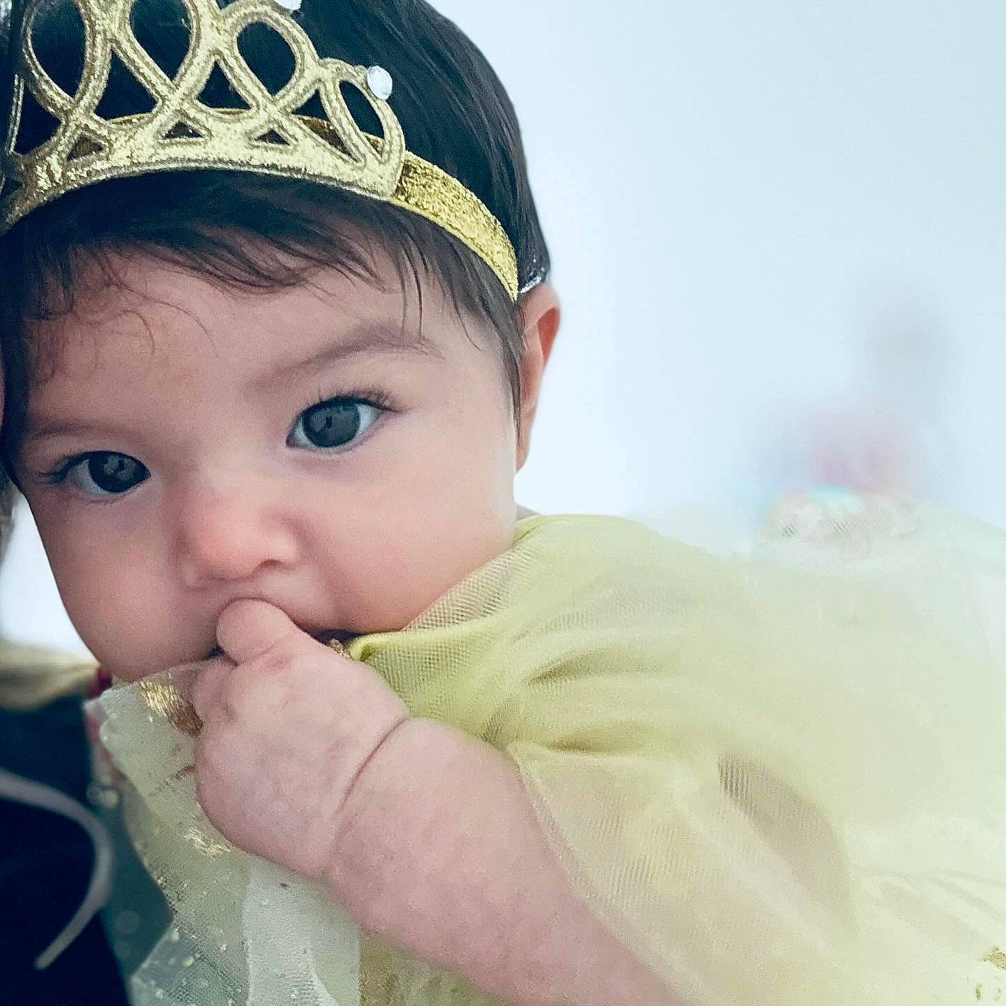 Julianna joined the competition — help win amazing prizes! baby, baby_toddler_clothing, cap, cheek, chin, ear, eye, eyebrow, eyelash, face, fashion_accessory, grass, happy, head, headgear, headpiece, iris, lip, person, sleeve