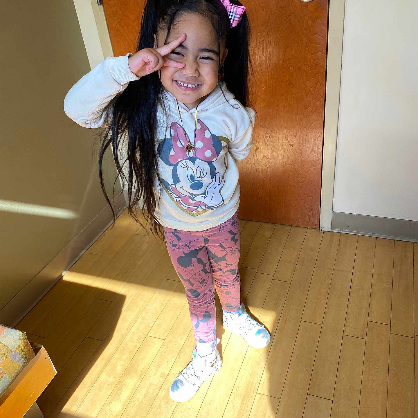 Stefanie Hall is registered to the contest to win money with this photo: child, clothing, door, face, female, footwear, girl, hair, happy, hardwood, head, indoors, interiordesign, pants, person, photography, portrait, shoe, smile, wood