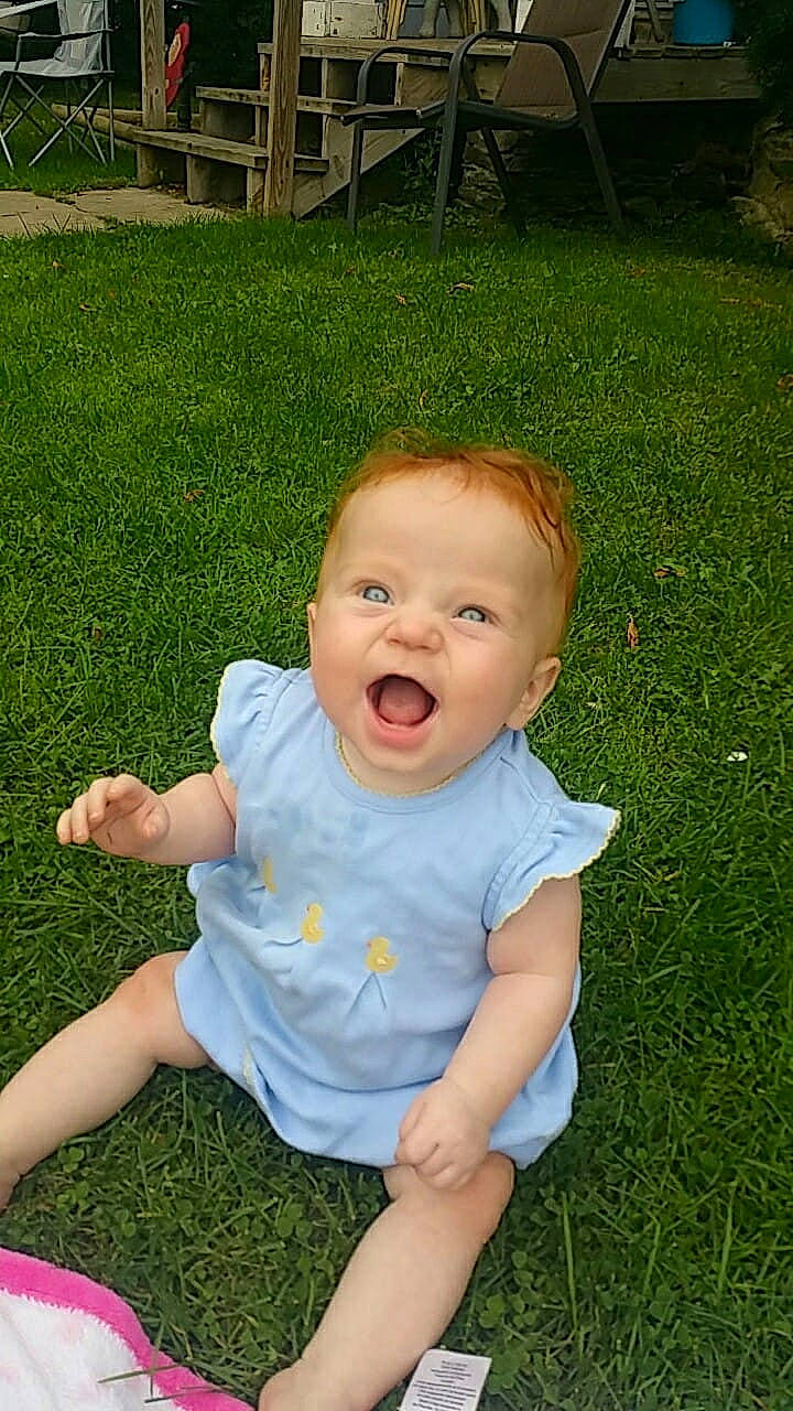 Braylynne joined the competition — help win amazing prizes! baby, child, garden, grass, grass_family, green, head, lawn, leaf, meadow, person, plant, sitting, skin, smile, summer, toddler, yard