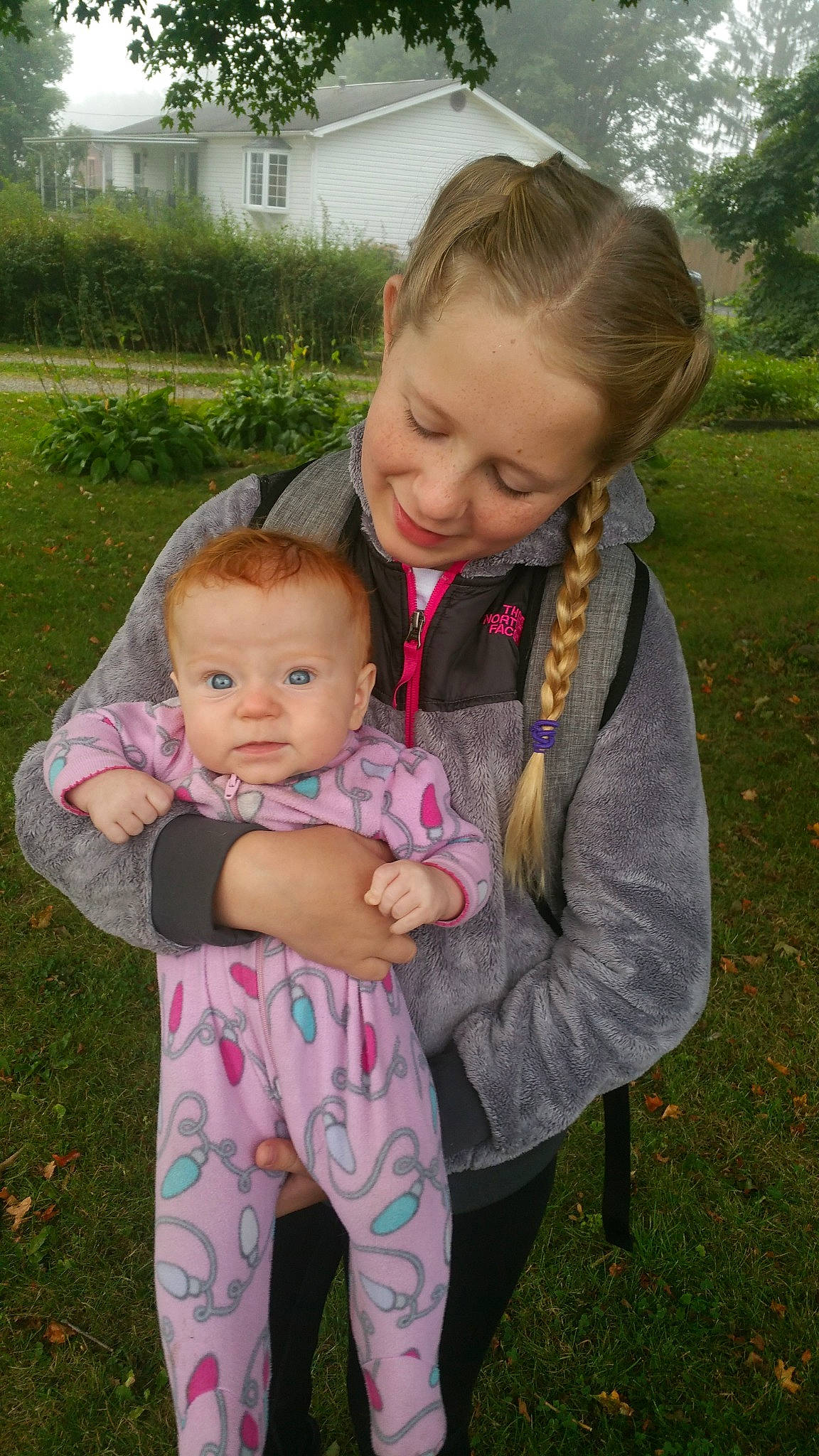 Braylynne is registered to the contest to win money with this photo: baby, child, daughter, grass, mother, people, person, pink, sibling, skin, smile, toddler