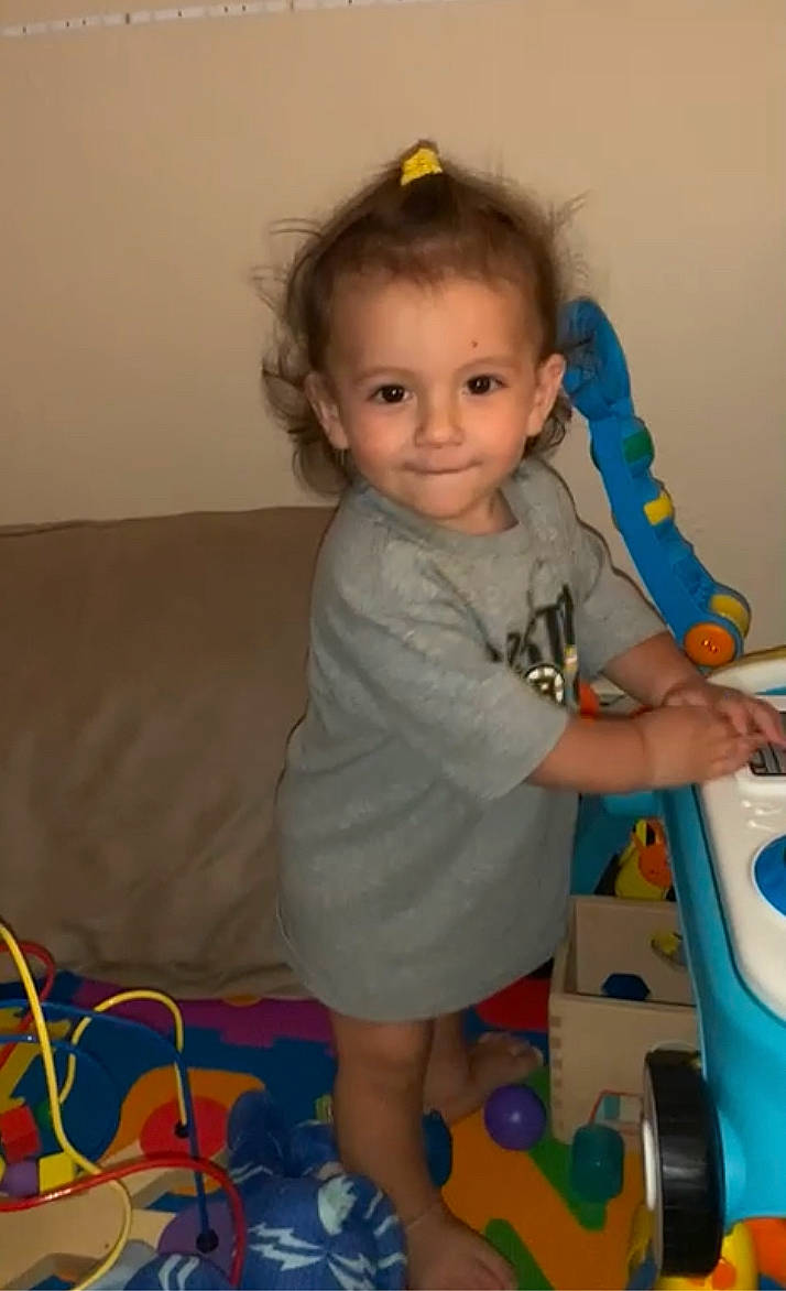 Benji joined the competition — help win amazing prizes! baby, baby_playing_with_toys, baby_toddler_clothing, baby_toys, blue, cheek, child, electric_blue, flooring, fun, head, iris, joy, person, play, room, sitting, skin, smile, standing