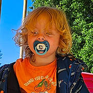Donnavee joined the competition — help win amazing prizes! blue_sky, casual_clothing, child, curly_hair, cute, daytime, jacket, nature, orange_shirt, outdoor, pacifier, play, playground, shorts, sitting, slide, summer, toddler, trees, young_child