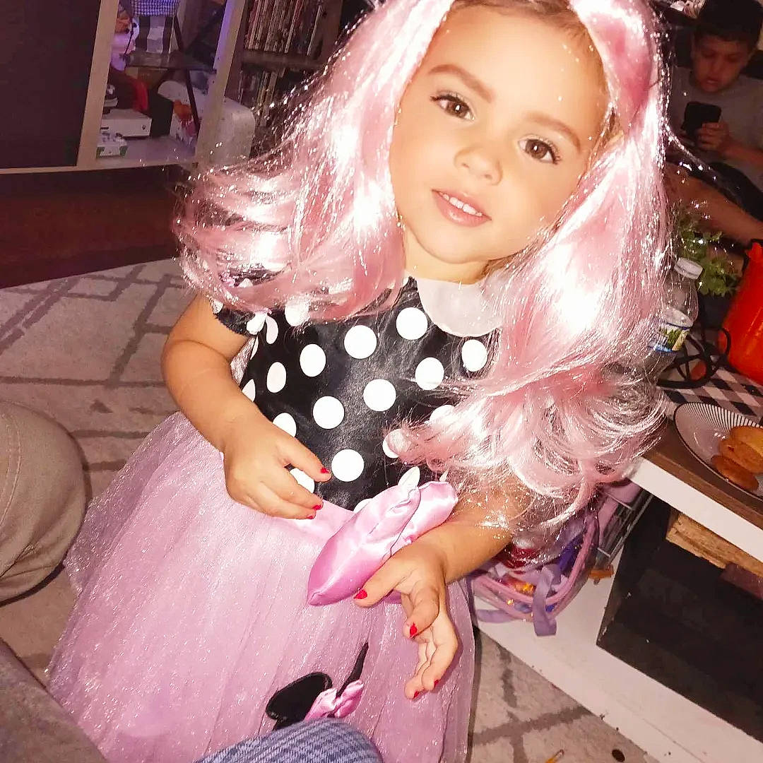 Alianna is registered to the contest to win money with this photo: baby_toddler_clothing, bangs, blond, brown_hair, embellishment, event, eyelash, fashion_accessory, fashion_design, hair, happy, iris, lace_wig, lip, long_hair, magenta, makeover, person, pink, smile
