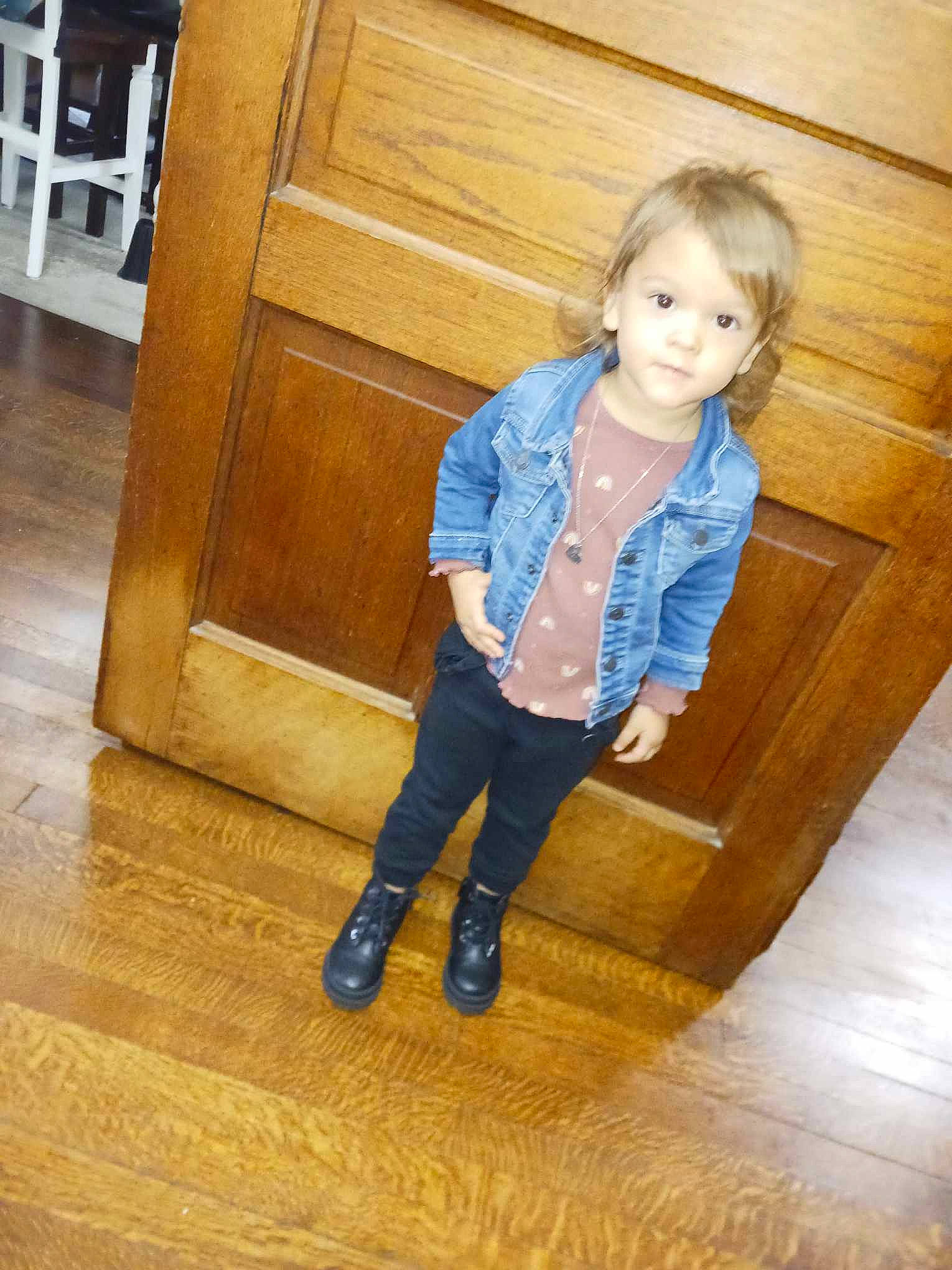 Alianna joined the competition — help win amazing prizes! brown_hair, denim, electric_blue, floor, flooring, hardwood, human_body, human_leg, jeans, laminate_flooring, leg, long_hair, person, plank, sitting, sleeve, thigh, toddler, varnish, wood