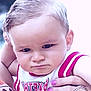Kélyan a rejoint le concours — aidez-le/la à gagner de superbes lots ! baby, child, face, person, hand, nail_polish, ring, jacket, basketball_jersey, patterned_clothing, expression, portrait, closeup, skin, hair, outdoor, holding, caucasian, young_child, fashion_accessory