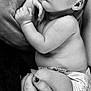 Evaleighn is registered to the contest to win money with this photo: baby, sleeping, infant, hand, diaper, black_and_white, closeup, face, person, skin, peaceful, resting, cuddle, newborn, portrait, child, soft, comfort, tenderness, adult_hand
