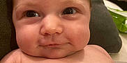 Evaleighn joined the competition — help win amazing prizes! baby, blanket, bottle, cheeks, child, couch, cute, expression, eyes, face, head, indoors, infant, newborn, pillow, portrait, skin, sleepwear, soft, young
