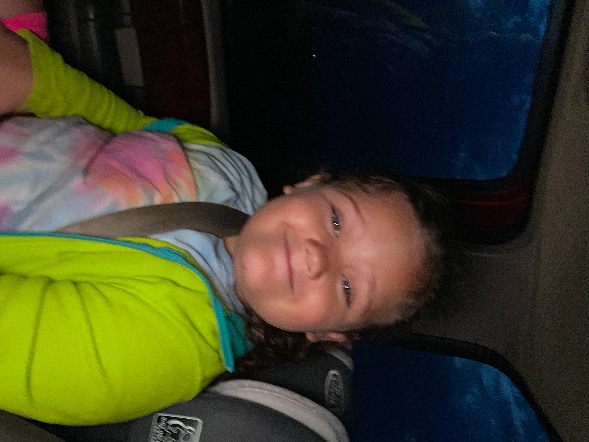 Aleigha is registered to the contest to win money with this photo: auto_part, automotive_exterior, car_seat, cheek, child, comfort, electric_blue, family_car, fun, happy, joy, leisure, luxury_vehicle, motor_vehicle, nose, person, sitting, smile, t_shirt, toddler