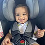 baby, car, car_seat, child, clothing, cute, feet, hands, happy, headrest, indoors, infant, memory_foam, person, safety_harness, seat, seatbelt, smiling, toddler, transportation