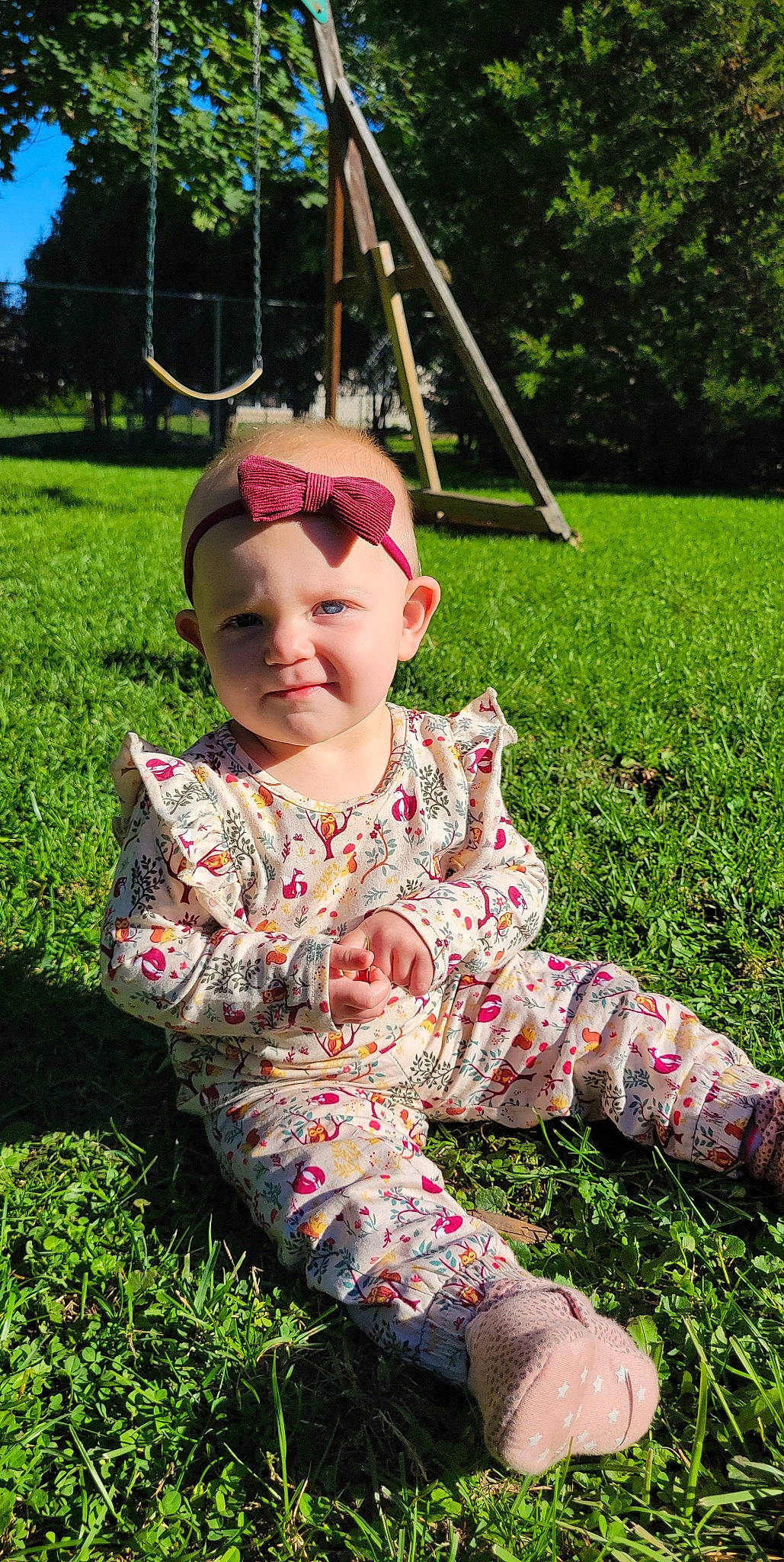 Cara is registered to the contest to win money with this photo: baby_toddler_clothing, botany, child, eyewear, goggles, grass, grass_family, green, groundcover, happy, headwear, joy, lawn, leaf, leisure, people_in_nature, person, pink, plant, recreation