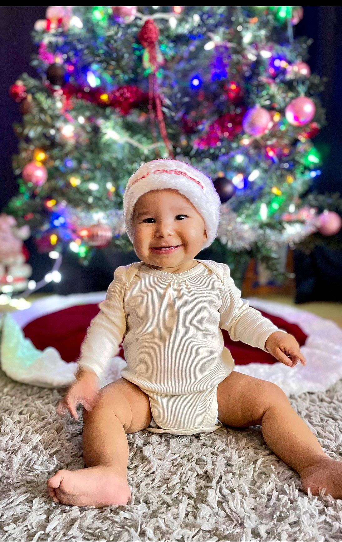 Halo joined the competition — help win amazing prizes! baby, baby_toddler_clothing, beauty, christmas_decoration, christmas_ornament, christmas_tree, face, facial_expression, fun, happy, headwear, holiday_ornament, joy, light, ornament, person, pink, purple, sleeve, smile