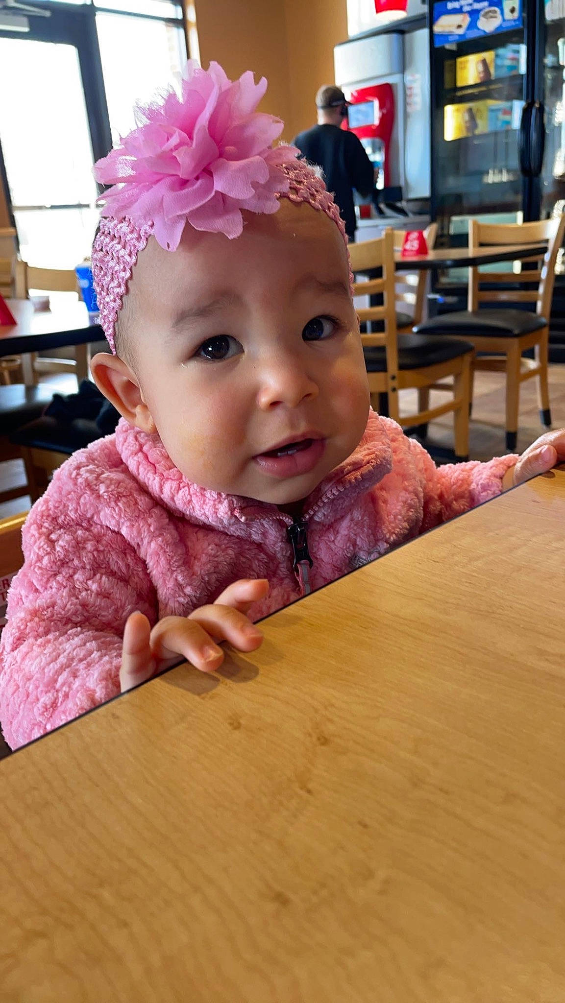 Halo is registered to the contest to win money with this photo: baby, baby_toddler_clothing, cheek, child, eyelash, fashion_accessory, flooring, fun, happy, hardwood, headband, headpiece, headwear, iris, leisure, lip, nose, person, skin, table