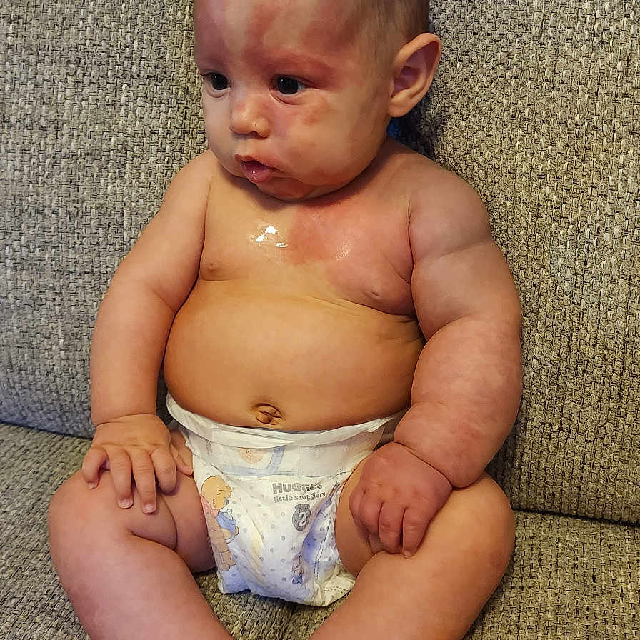 Zaya joined the competition — help win amazing prizes! baby, back, bodypart, chair, couch, cushion, diaper, face, finger, furniture, hand, head, homedecor, newborn, person, photography, portrait, sitting, standing, toy