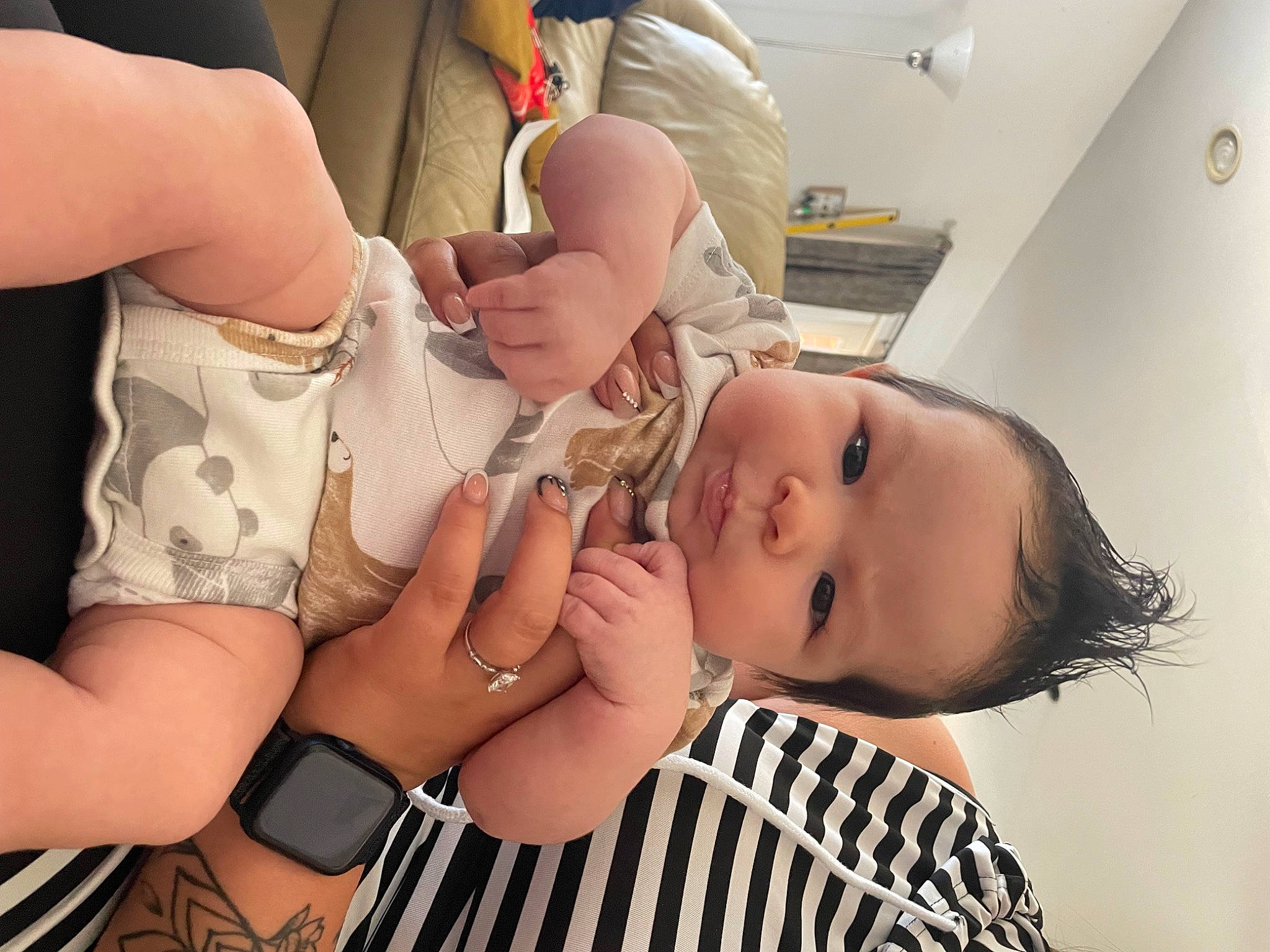 Odin is registered to the contest to win money with this photo: arm, baby, baby_toddler_clothing, beauty, chest, child, comfort, eyelash, gesture, hand, joint, leg, mouth, nail, pattern, person, skin, thigh, thumb, toddler