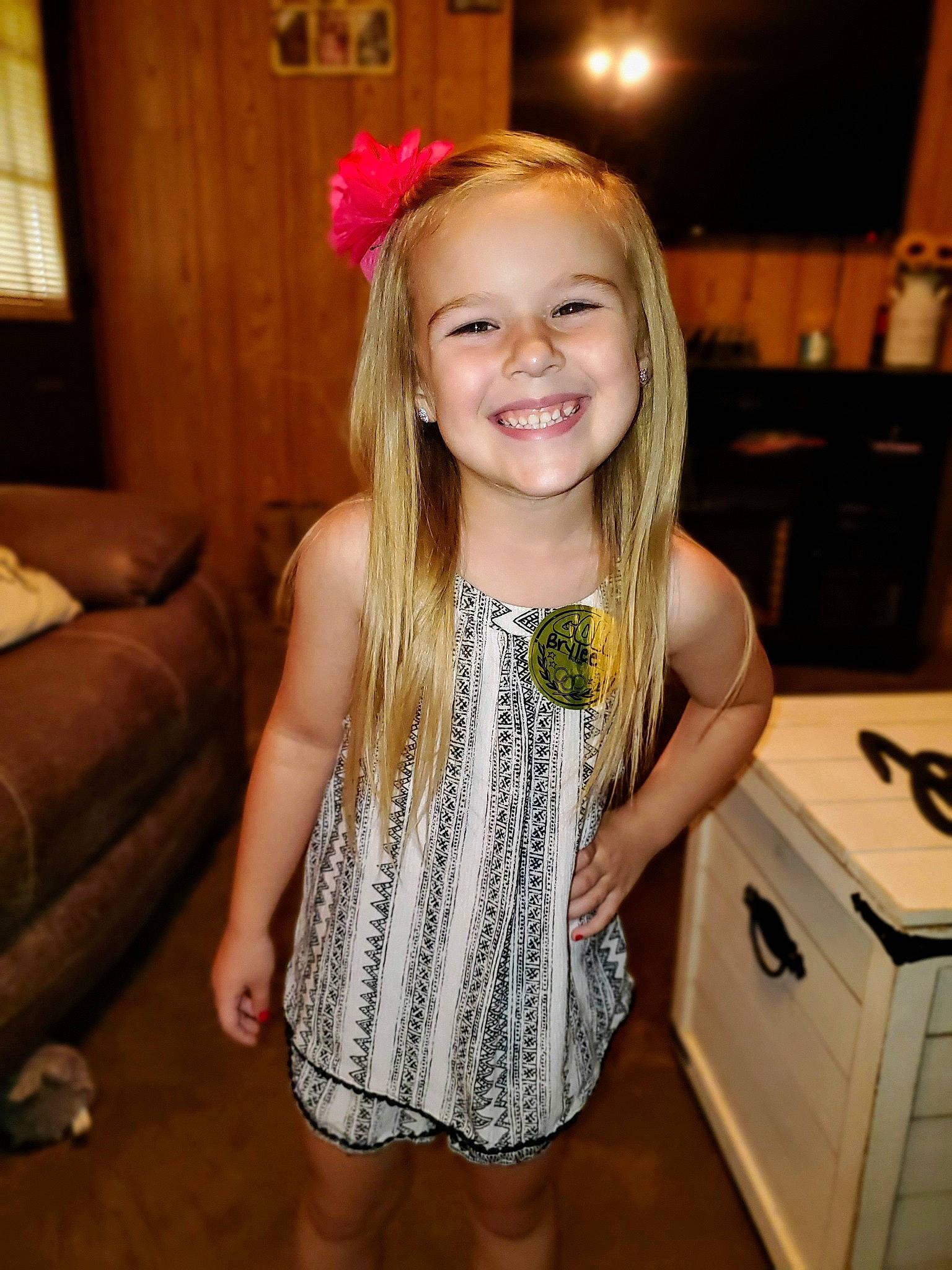 Brylee joined the competition — help win amazing prizes! cabinetry, chair, clothing, couch, countertop, drawer, dress, face, flash_photography, fun, gas_stove, hair, hairstyle, happy, head, iris, joy, kitchen_appliance, kitchen_stove, person