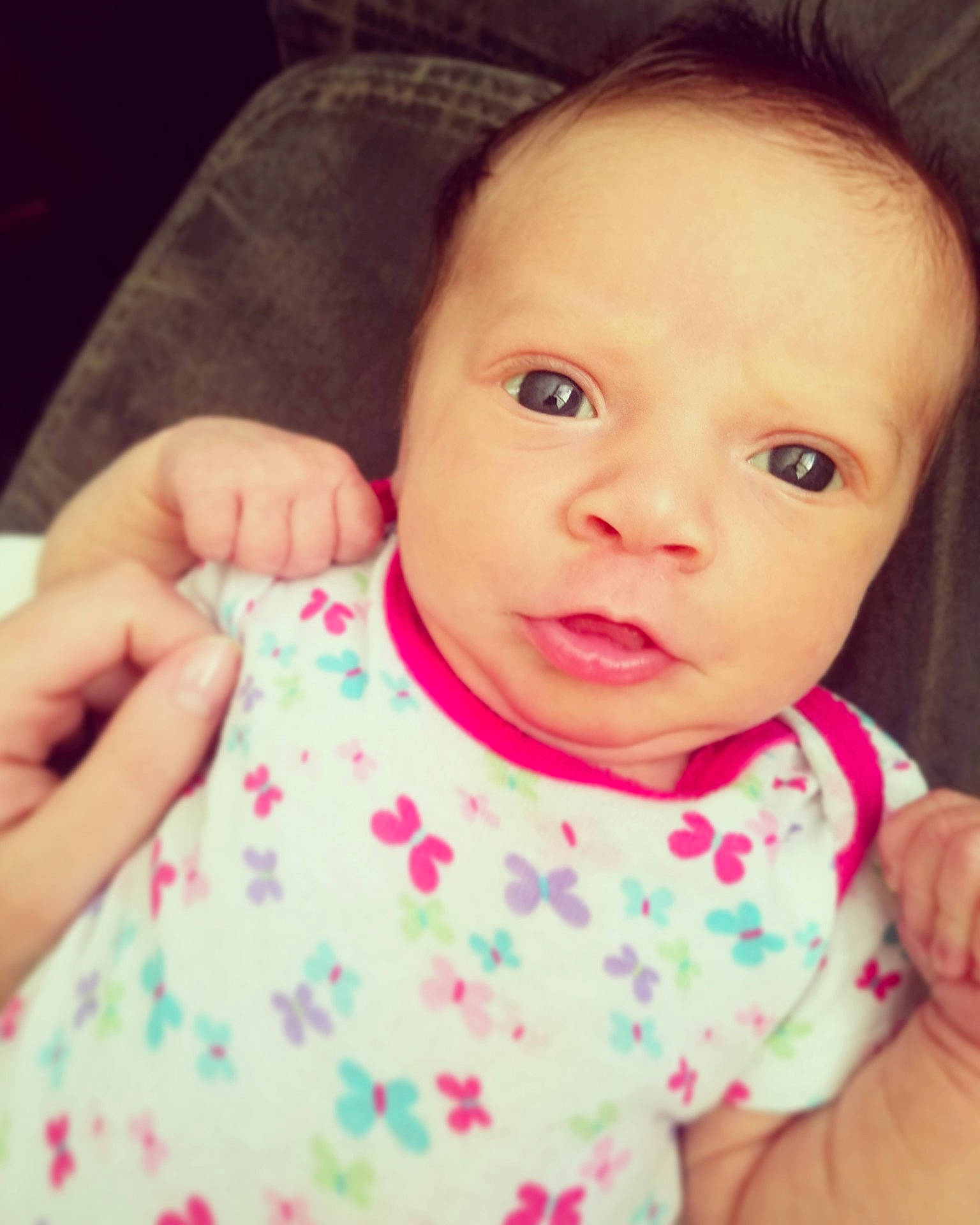 Averie is registered to the contest to win money with this photo: brown_hair, cheek, child, ear, eye, eyebrow, face, finger, girl, head, infant, iris, lip, mouth, nose, person, pink, skin, smile, toddler