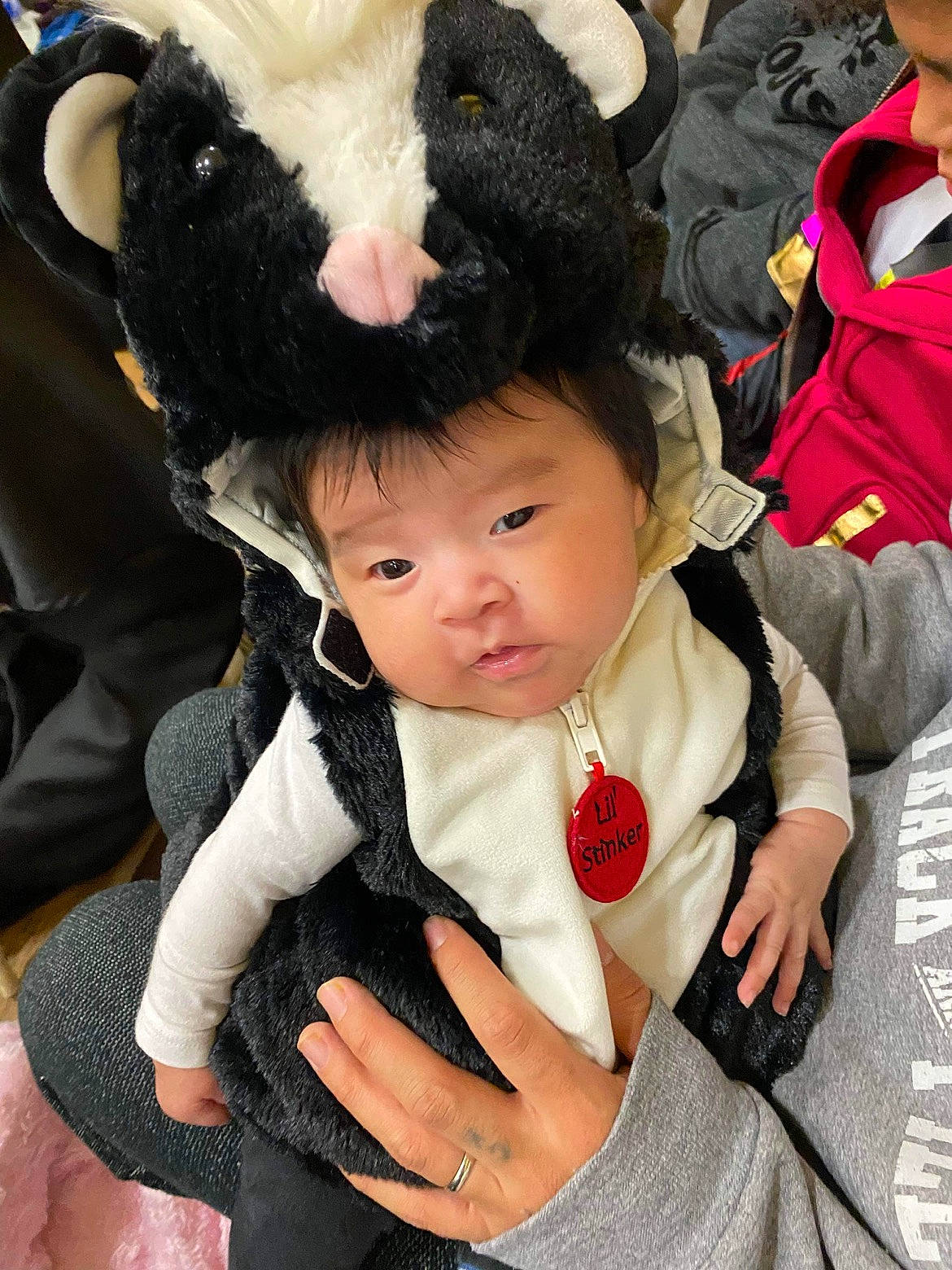 Kelly joined the competition — help win amazing prizes! baby, baby_products, baby_toddler_clothing, cap, carmine, child, costume, event, facial_expression, formal_wear, fun, fur, gesture, happy, hat, person, sitting, skin, toddler, tradition