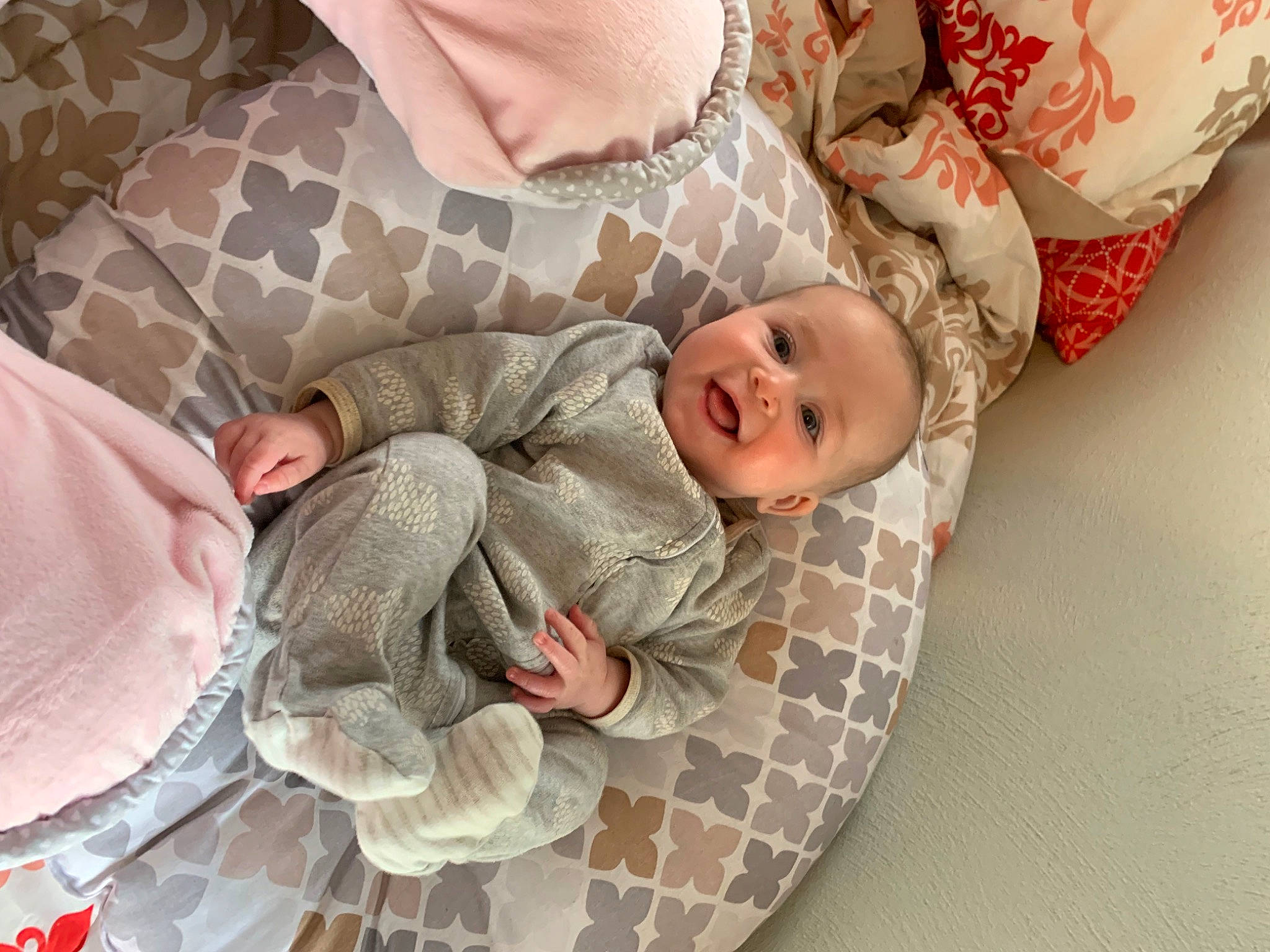 Wynonna is registered to the contest to win money with this photo: baby, baby_products, baby_sleeping, baby_toddler_clothing, bedding, bedtime, carmine, child, comfort, eye, flooring, human_body, linens, nap, pattern, person, room, skin, smile, toddler