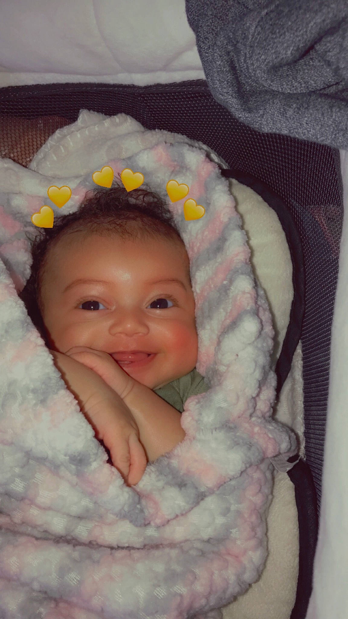 Cleo is registered to the contest to win money with this photo: baby, baby_products, baby_toddler_clothing, cheek, child, chin, comfort, eye, eyebrow, fashion_accessory, fun, happy, head, iris, joy, linens, nose, person, skin, sleeve