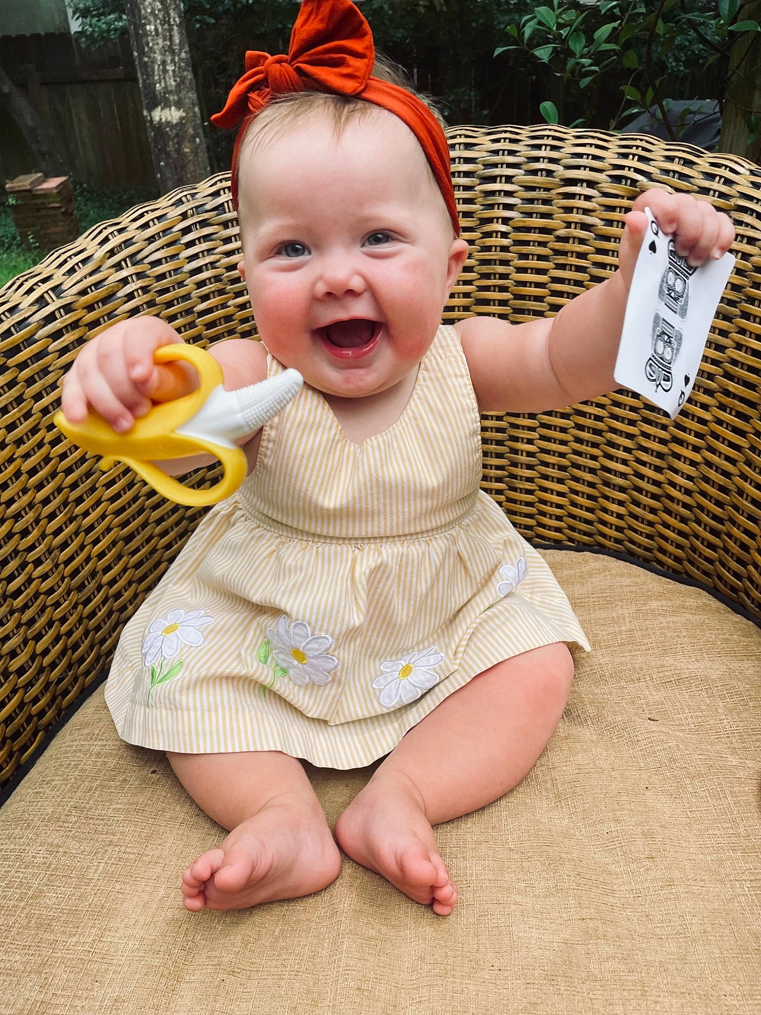 Bowie is registered to the contest to win money with this photo: art, baby, baby_toddler_clothing, child, costume_hat, face, finger, foot, fun, grass, happy, hat, human_leg, mouth, person, pink, skin, sleeve, smile, thumb