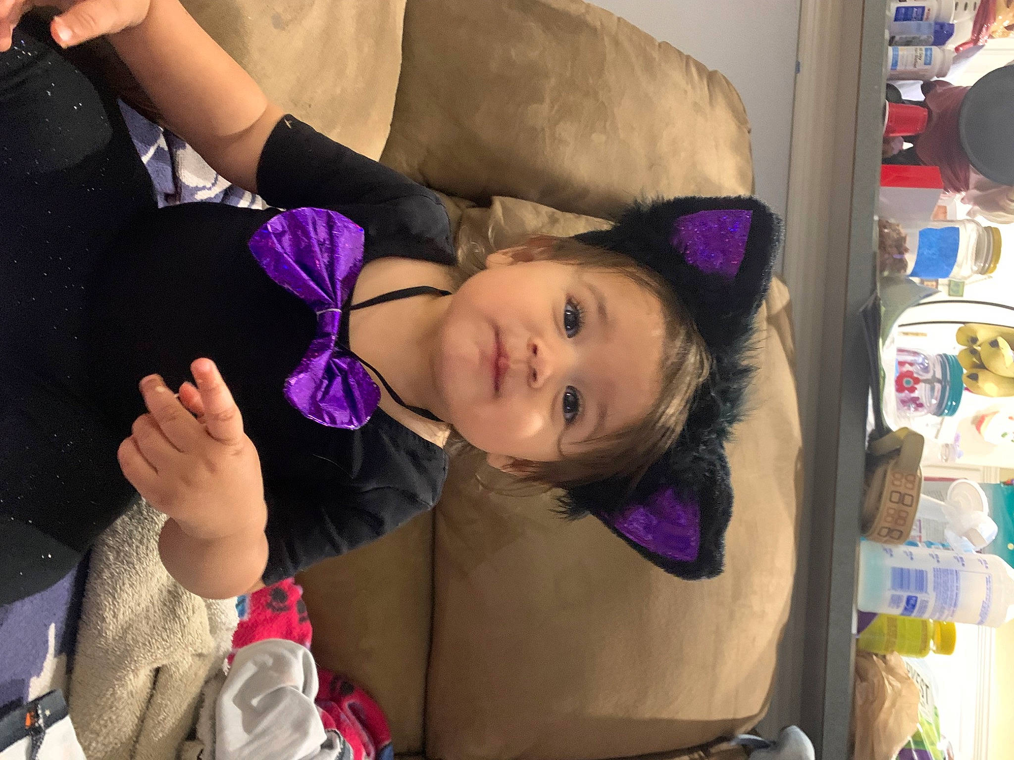 Alaïa is registered to the contest to win money with this photo: cheek, child, ear, event, eyebrow, eyelash, fun, gesture, hairstyle, happy, lip, magenta, mouth, nose, person, pink, purple, skin, smile, toddler