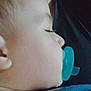 Andrew joined the competition — help win amazing prizes! baby, sleeping, pacifier, close_up, face, adult, smile, blanket, cozy, child, parent, comfort, rest, indoor, skin, head, peaceful, family, tender, portrait