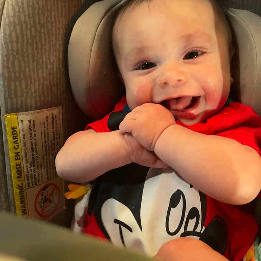 Nathaniel joined the competition — help win amazing prizes! baby, bodypart, clothing, cushion, electronics, face, finger, hand, happy, head, headrest, homedecor, laughing, newborn, person, photography, portrait, t_shirt, transportation, vehicle