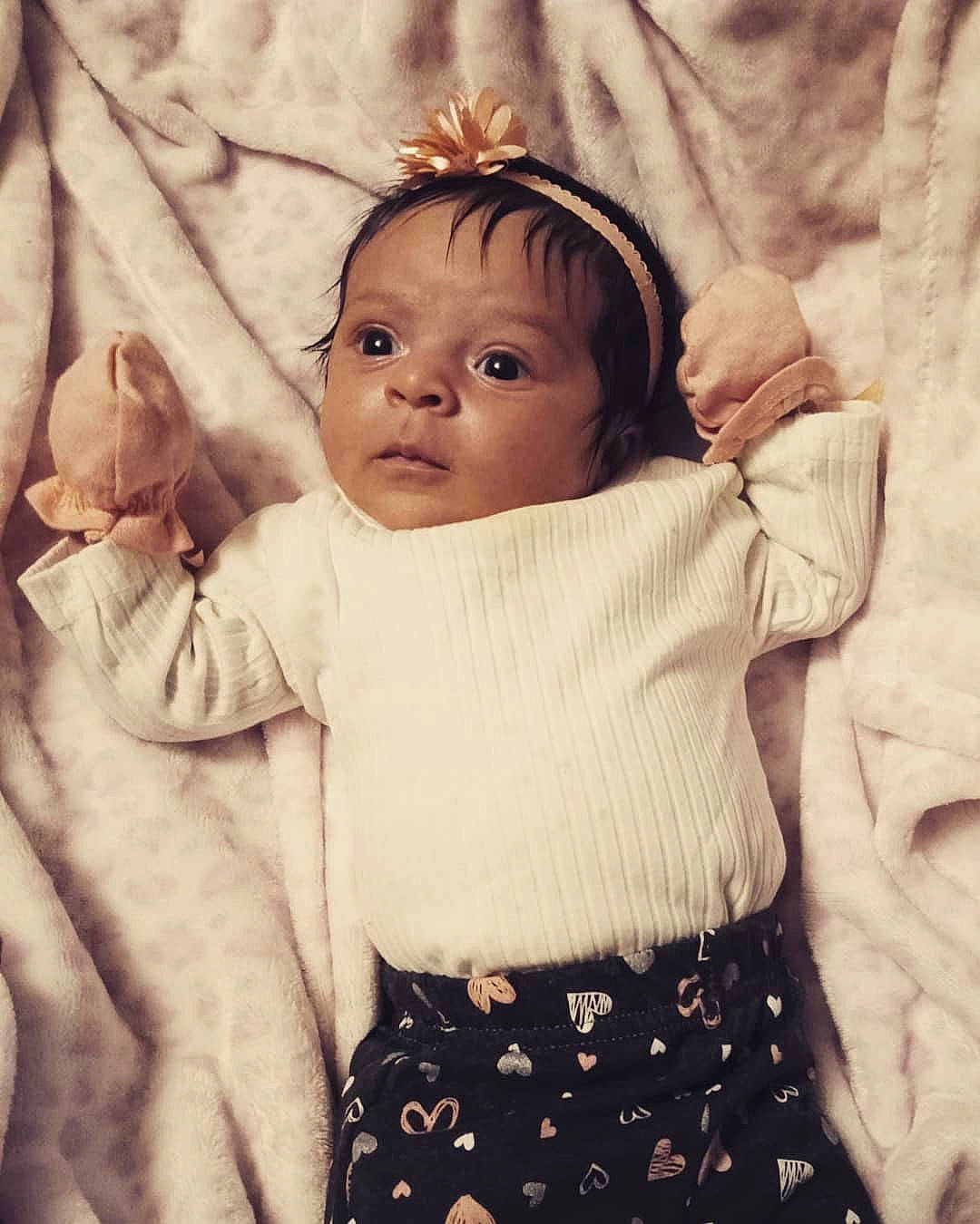 Alora Violet is registered to the contest to win money with this photo: arm, baby, cheek, child, eye, face, forehead, gesture, hand, happy, head, iris, nose, organ, person, photography, portrait, product, skin, smile