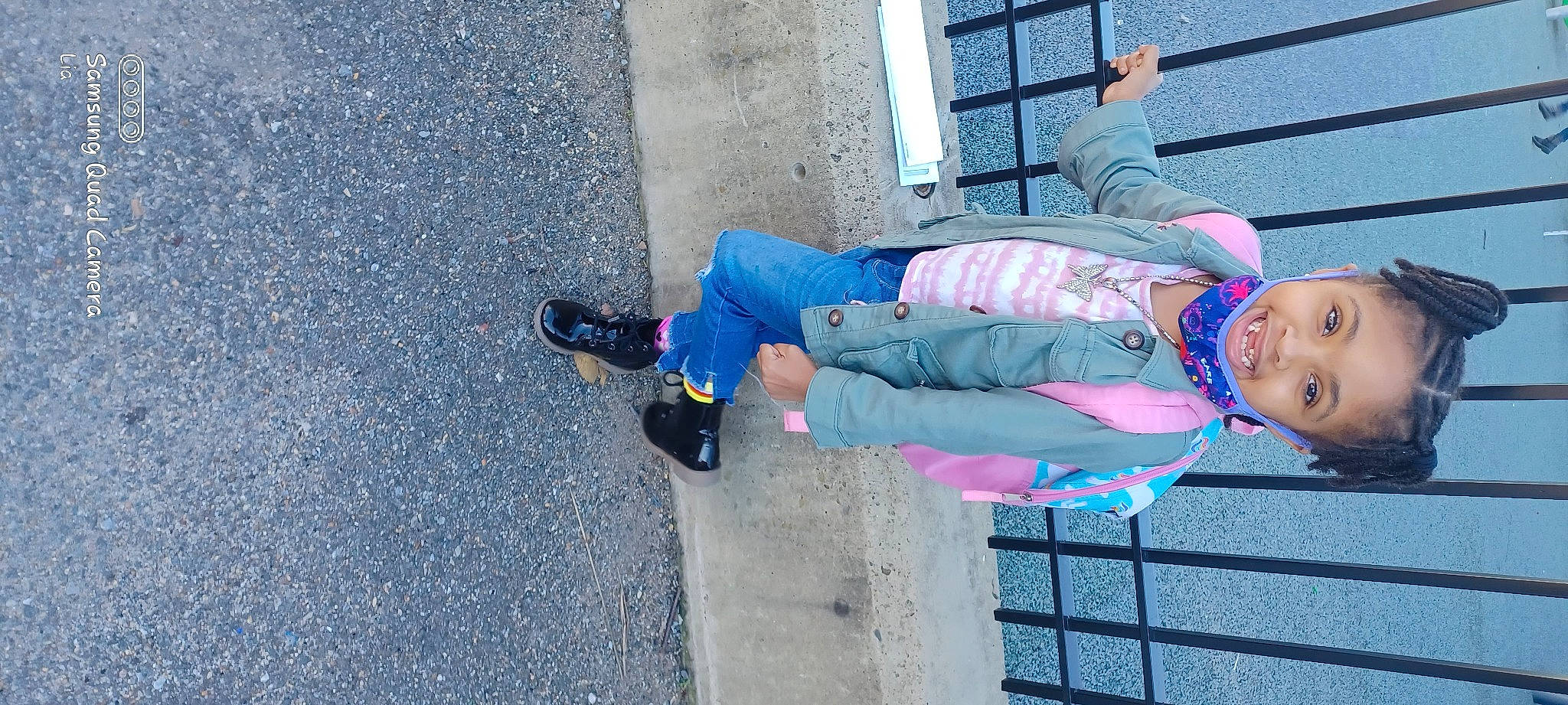 Lotus is registered to the contest to win money with this photo: asphalt, child, concrete, denim, electric_blue, foot, fun, hat, human_leg, joy, leisure, outdoor_shoe, pattern, pedestrian, person, road_surface, shoe, sidewalk, smile, thigh