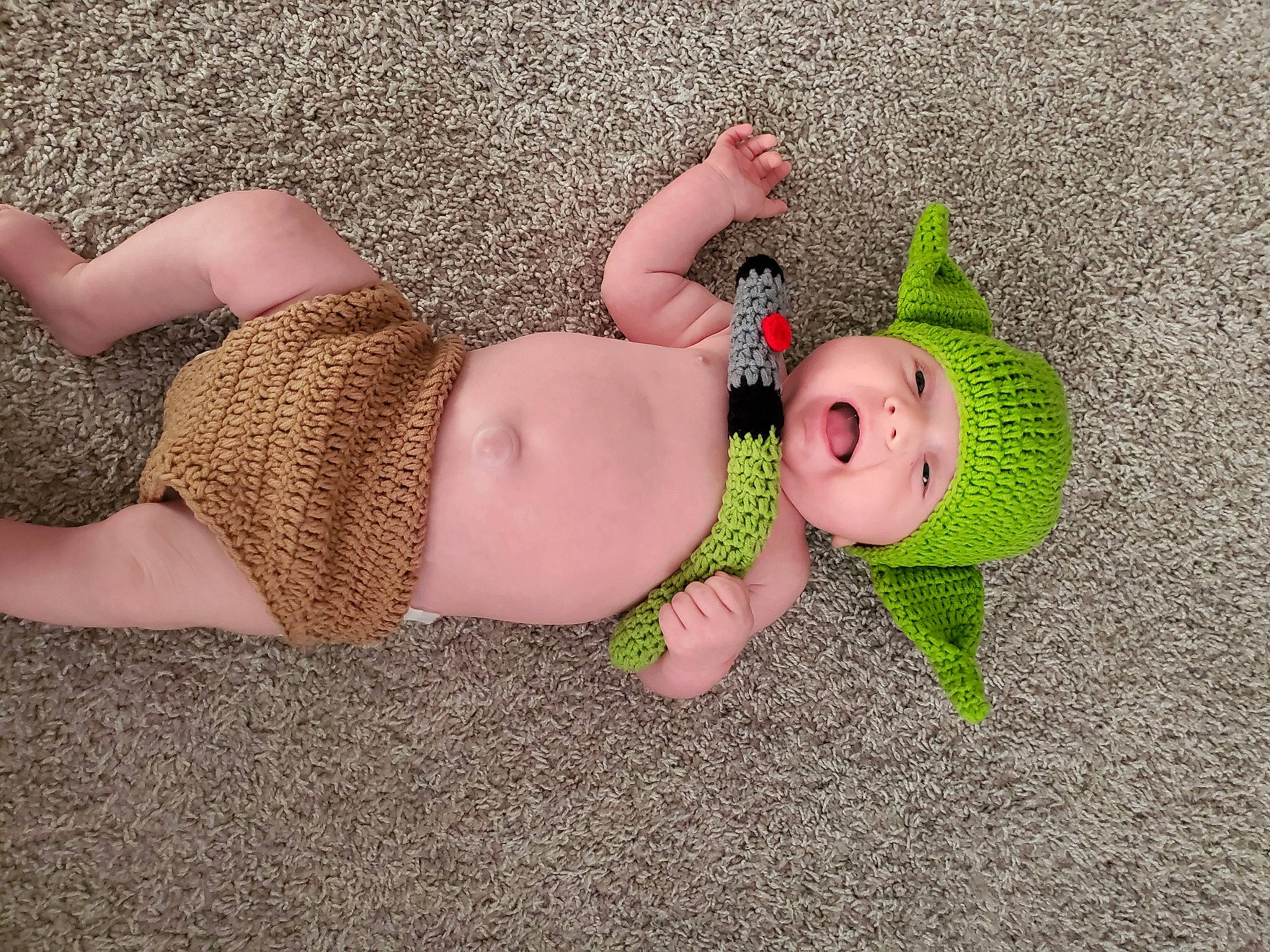 Ayden is registered to the contest to win money with this photo: abdomen, baby, baby_toddler_clothing, barefoot, chest, elbow, finger, foot, fun, grass, headgear, headwear, human_body, human_leg, knee, person, thigh, toddler, trunk, undergarment