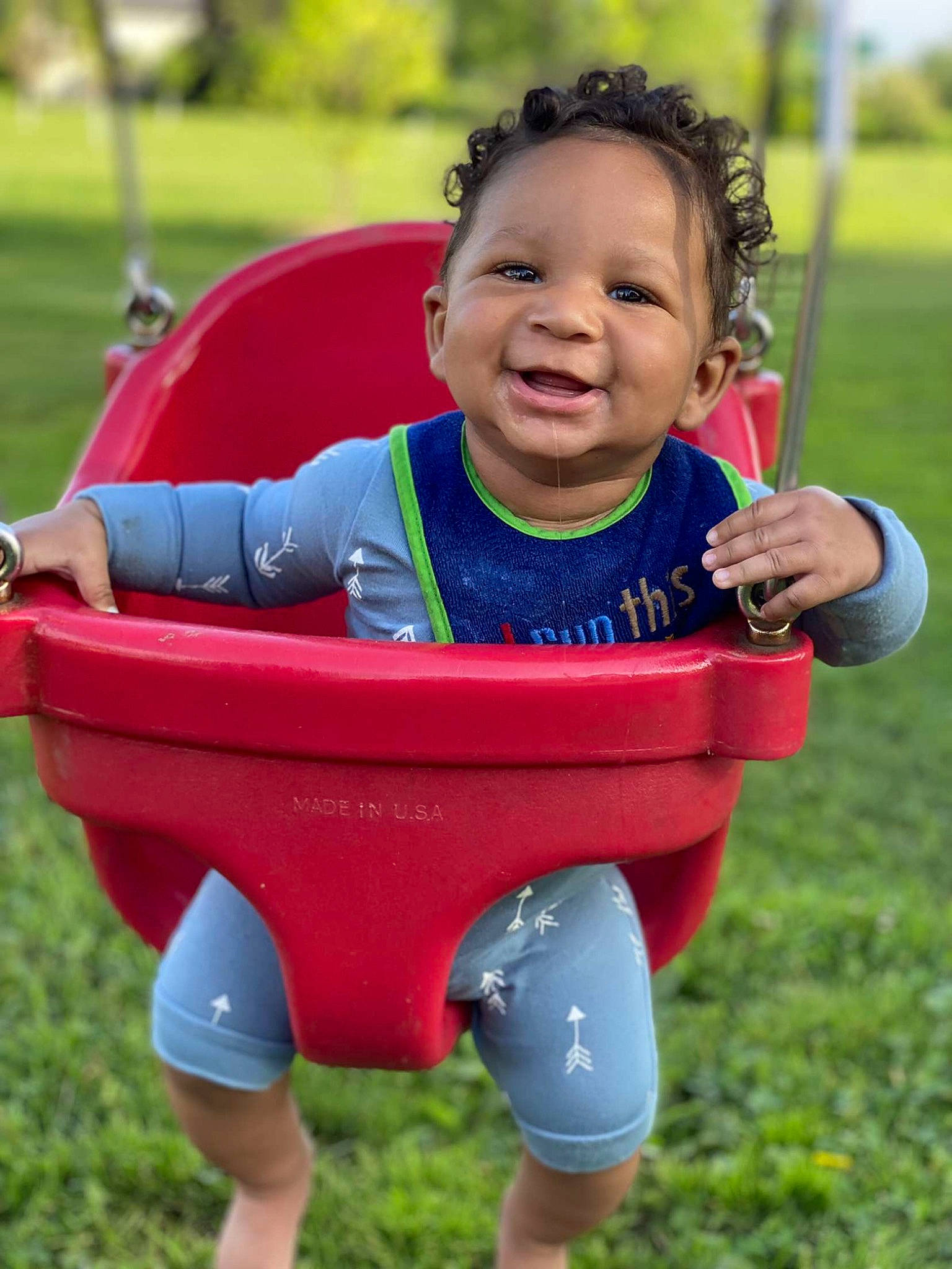 Kentrell is registered to the contest to win money with this photo: baby, baby_carriage, baby_products, baby_toddler_clothing, chair, child, city, eye, fun, grass, happy, joy, leisure, people_in_nature, person, plant, recreation, smile, swing, toddler