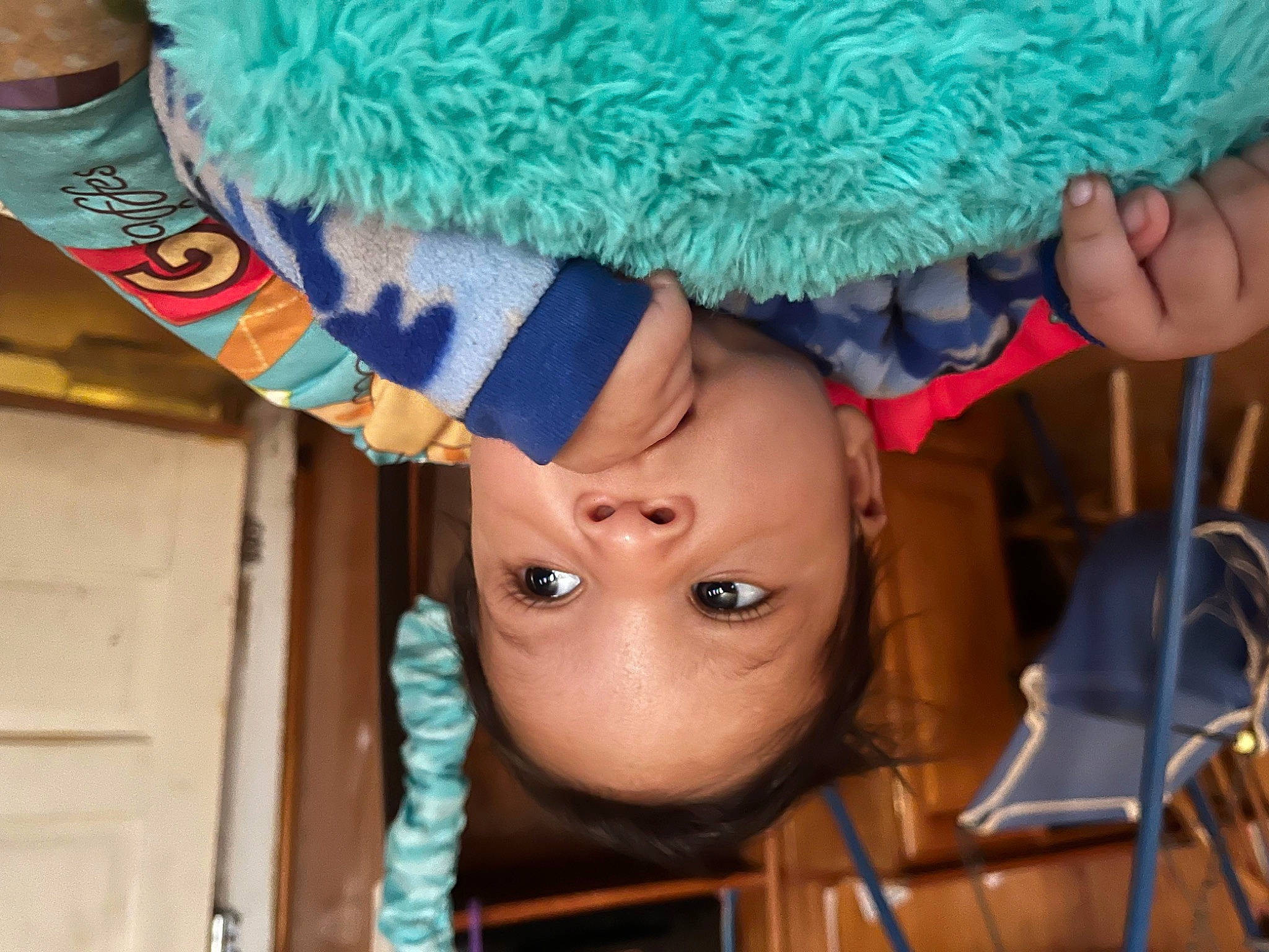 Kentrell is registered to the contest to win money with this photo: cap, costume_accessory, costume_hat, electric_blue, eyelash, fashion_accessory, fur, glove, green, happy, hat, headgear, knit_cap, natural_material, person, personal_protective_equipment, street_fashion, thread, wood, wool