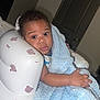 Ronald joined the competition — help win amazing prizes! baby, child, blanket, blue_blanket, indoor, inflatable_chair, bear_pattern, curious, wide_eyes, soft_texture, hand, face, person, cute, cozy, young_child, infant, portrait, furniture, room