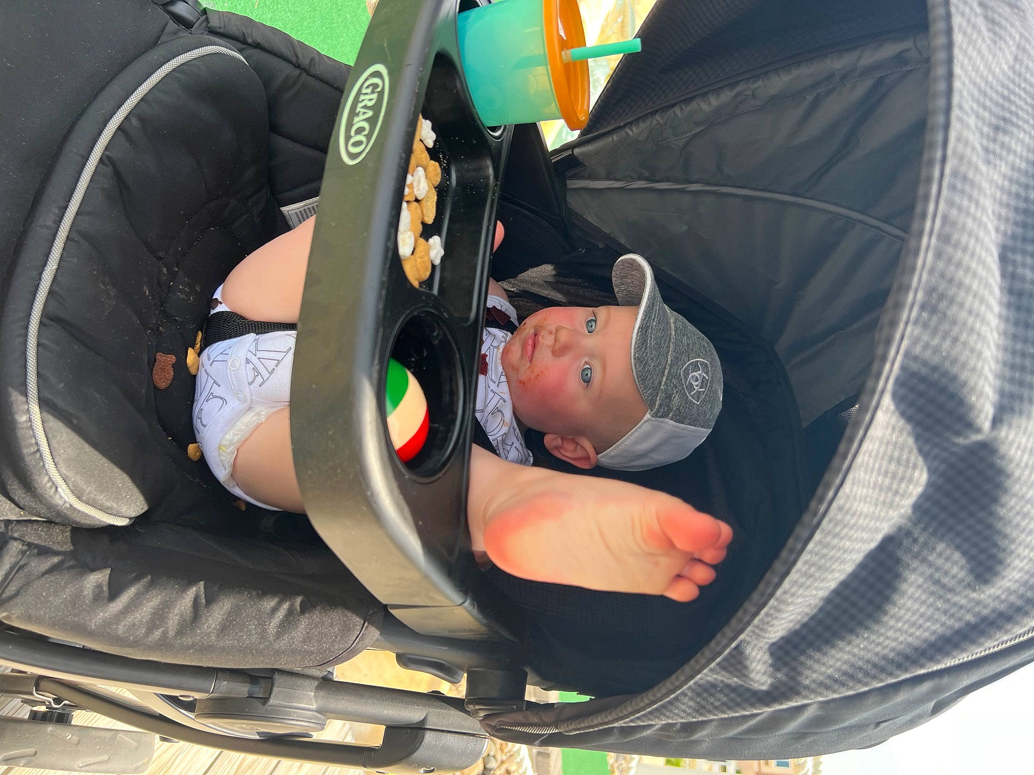 Briggs is registered to the contest to win money with this photo: auto_part, automotive_design, automotive_tire, automotive_wheel_system, car, car_seat, car_seat_cover, comfort, fun, hat, headwear, mode_of_transport, motor_vehicle, orange, person, recreation, rim, steering_wheel, tire, vehicle