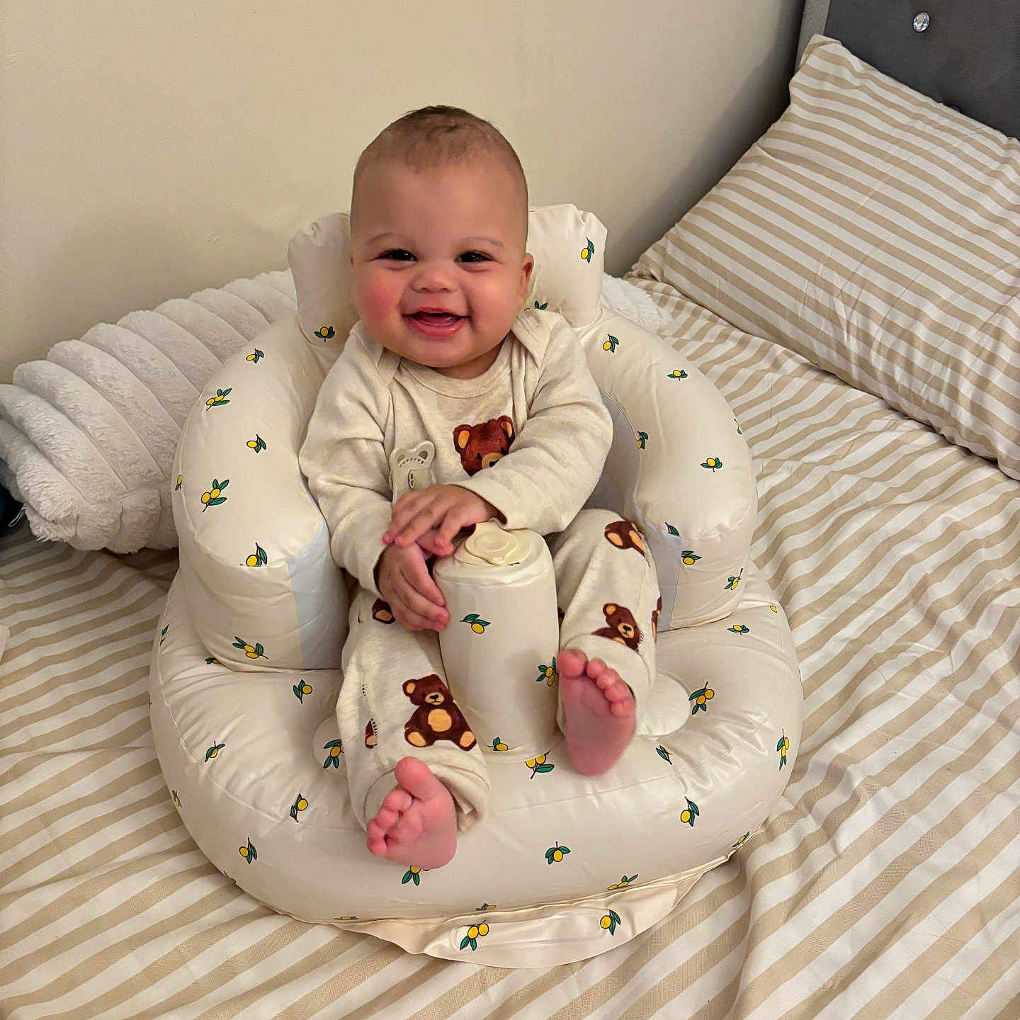 Ace joined the competition — help win amazing prizes! baby, infant, smiling, pajamas, baby_seat, bed, striped_bedding, pillow, headboard, teddy_bear_pattern, cushion, indoor, happy, child, cute, plush, comfortable, person, portrait, rosy_cheeks