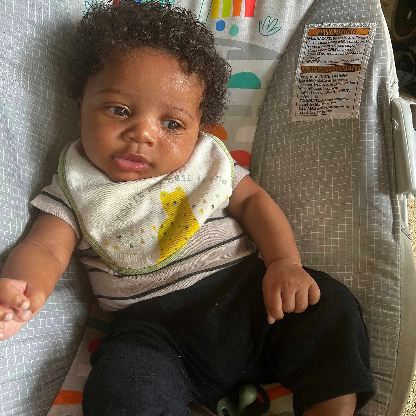 Yazariahla joined the competition — help win amazing prizes! adorable, animal_print, baby, baby_seat, bib, black_pants, child, clothing, colorful, comfort, curly_hair, cute, indoor, infant, looking_away, pacifier, playful, relaxed, seat, young