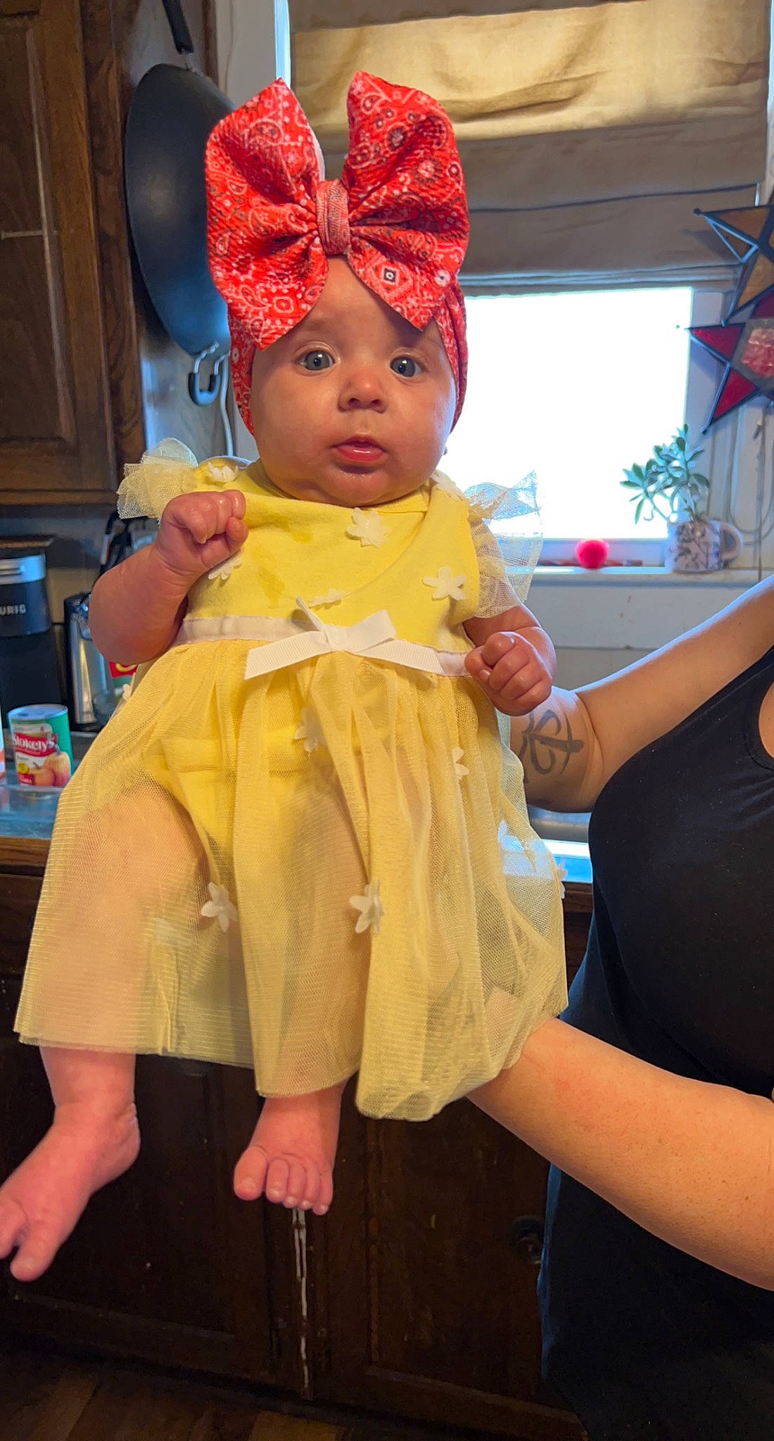 Oakley is registered to the contest to win money with this photo: baby, beanie, cap, child, costume, costume_hat, event, fashion_accessory, fun, happy, hat, headgear, headwear, knit_cap, magenta, orange, party_supply, peach, person, pink