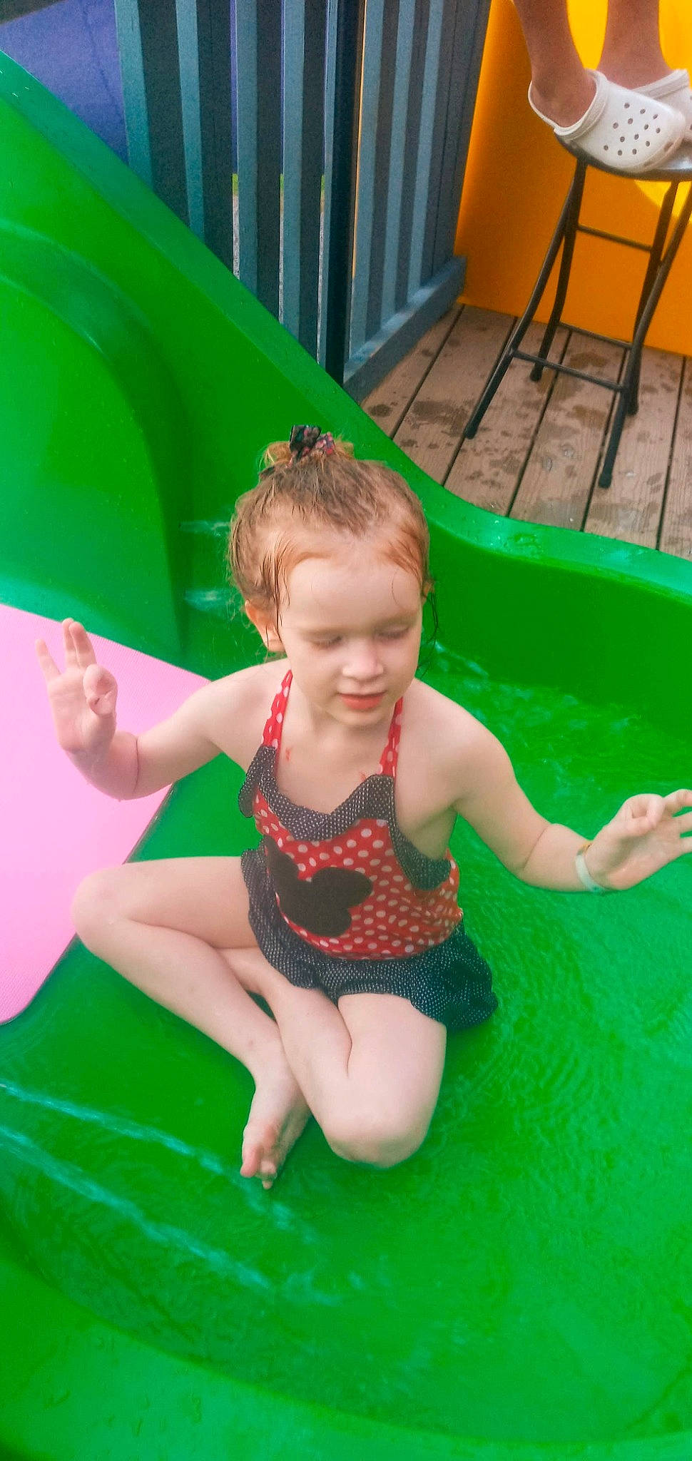Nataleigh is registered to the contest to win money with this photo: baby, baby_toddler_clothing, bathing, child, chute, fun, grass, green, happy, leisure, nonbuilding_structure, person, play, playground, recreation, smile, swimwear, thigh, toddler, water