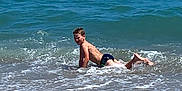Naël participe au concours pour gagner de l'argent avec cette photo : child, boy, beach, ocean, water, waves, sand, swimwear, playing, summer, outdoor, sunny, shore, vacation, holiday, fun, nature, sea, wave_splash, bare_chest
