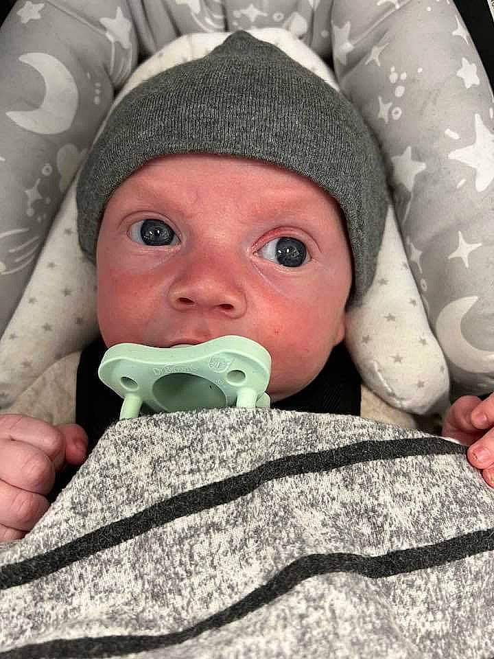 Layne joined the competition — help win amazing prizes! baby, baby_toddler_clothing, cheek, child, chin, comfort, eye, eyebrow, eyelash, face, facial_expression, finger, gesture, headwear, linens, mouth, nose, person, product, skin