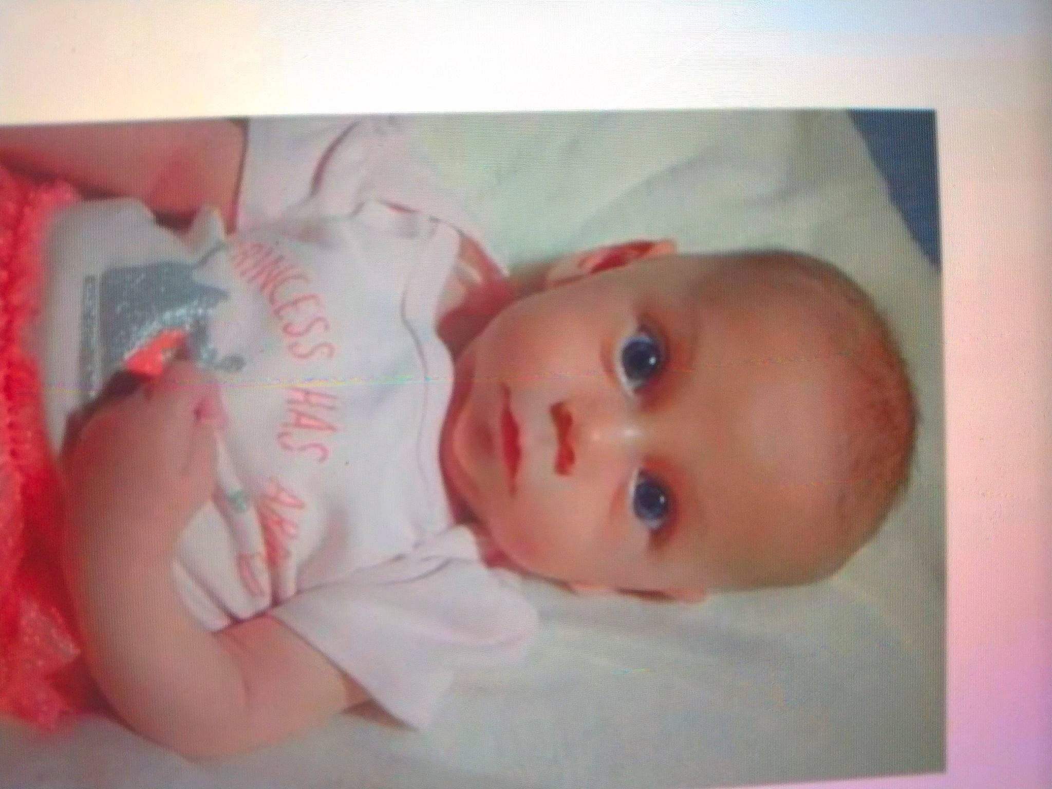 Lylia is registered to the contest to win money with this photo: art, baby, baby_products, baby_safety, baby_toddler_clothing, cheek, chest, child, comfort, eyelash, human_body, infant_bed, iris, linens, lip, nose, person, room, toddler