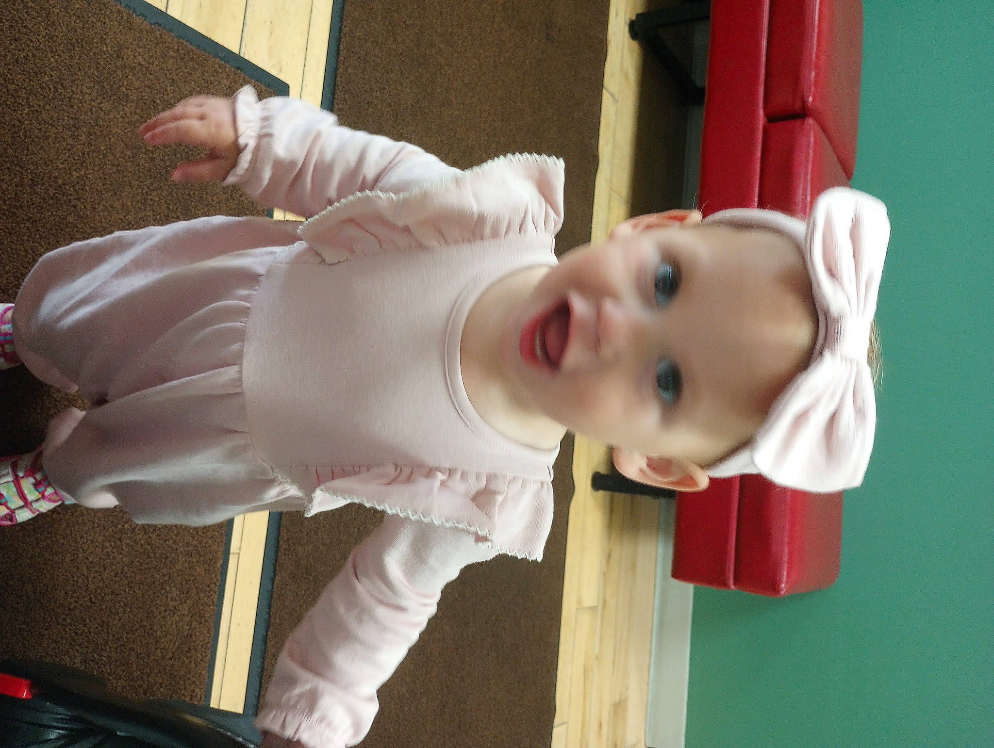 Lylia is registered to the contest to win money with this photo: art, baby, baby_toddler_clothing, carmine, cheek, child, costume, fun, happy, hat, mouth, nose, person, pink, room, toddler, window, wood