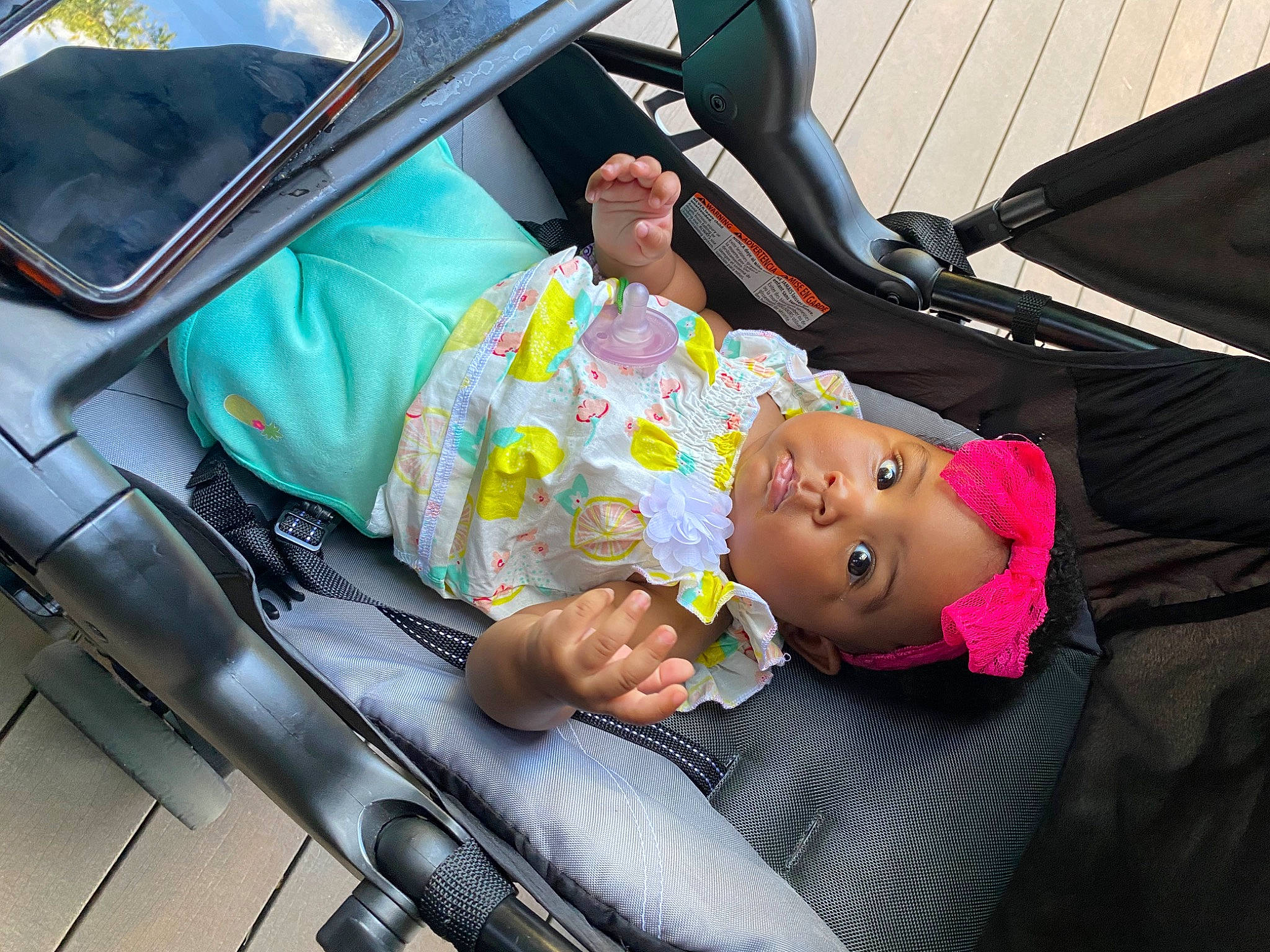 Londynn is registered to the contest to win money with this photo: auto_part, car, child, family_car, headwear, motor_vehicle, person, product, toddler, vacation, vehicle, vehicle_door