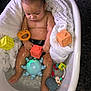 Léo participe au concours pour gagner de l'argent avec cette photo : baby, bathtub, water, toy, blanket, child, infant, bath, skin, wet, cute, play, orange, yellow, blue, white, floor, relax, indoors, small