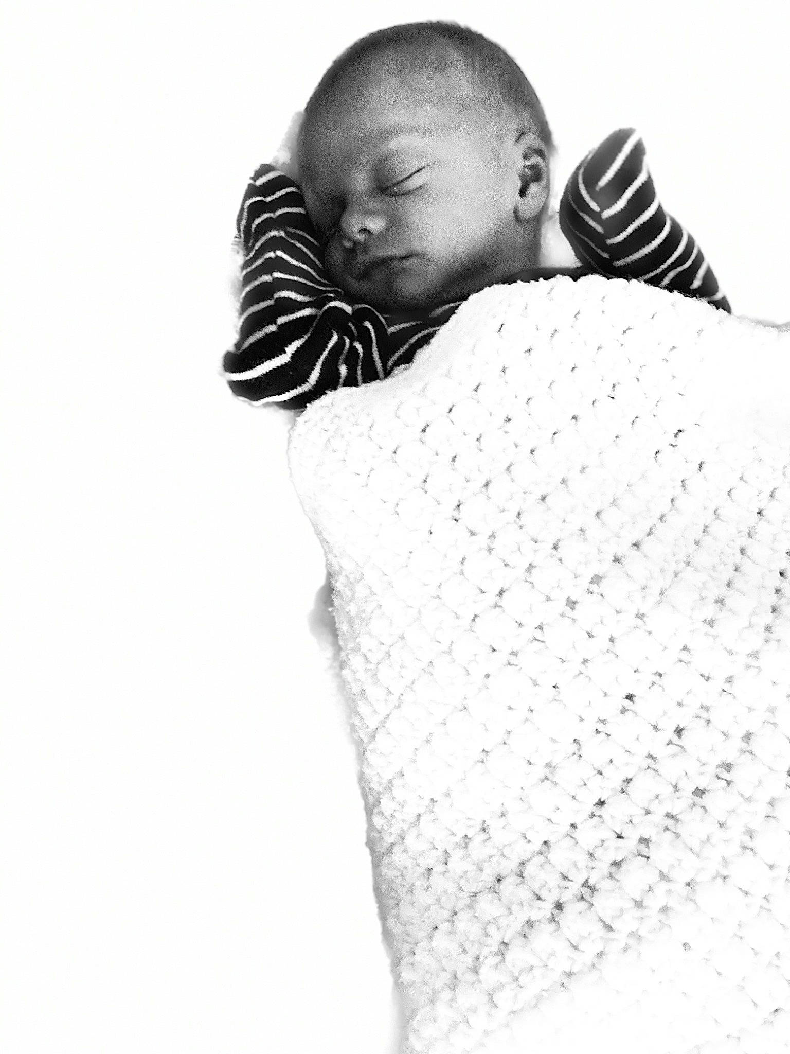 Braylin is registered to the contest to win money with this photo: arm, baby, baby_sleeping, black_and_white, child, monochrome, monochrome_photography, person, photograph, photography, sleep, stock_photography, style, white