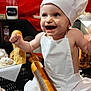 Nyx joined the competition — help win amazing prizes! baby, child, chef_hat, apron, rolling_pin, bread, cookies, milk_bottle, flour, kitchen, baking, smiling, happy, sitting, food, table, white_clothing, infant, cute, playful