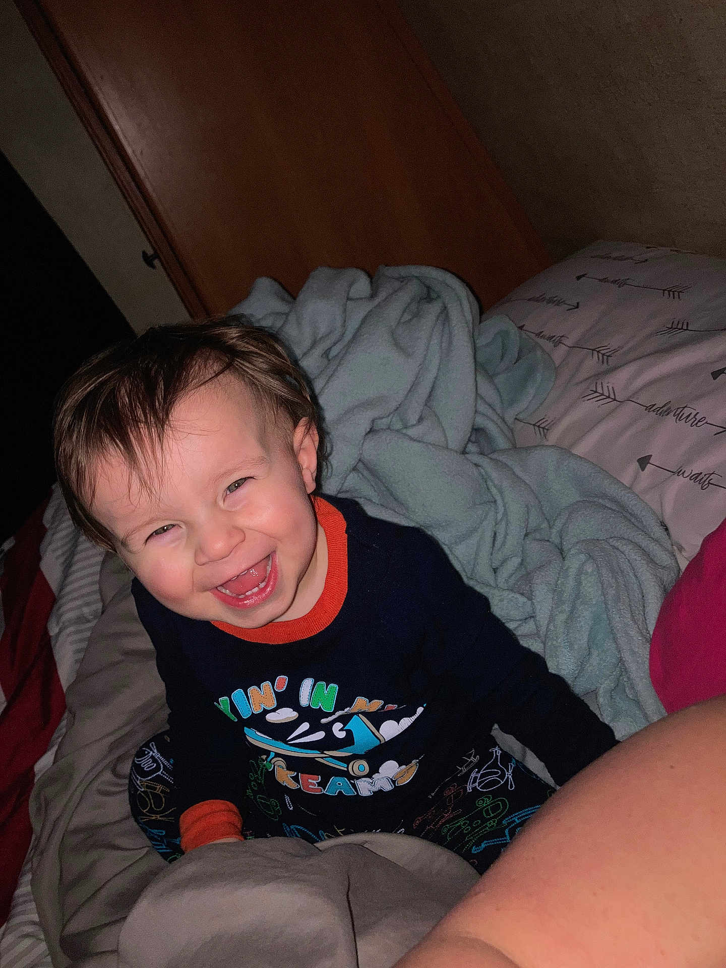 Braxton joined the competition — help win amazing prizes! toddler, child, smiling, happy, bed, blanket, pillow, indoor, cozy, clothing, person, face, hair, expression, playing, cute, young, fun, joy, sleepwear